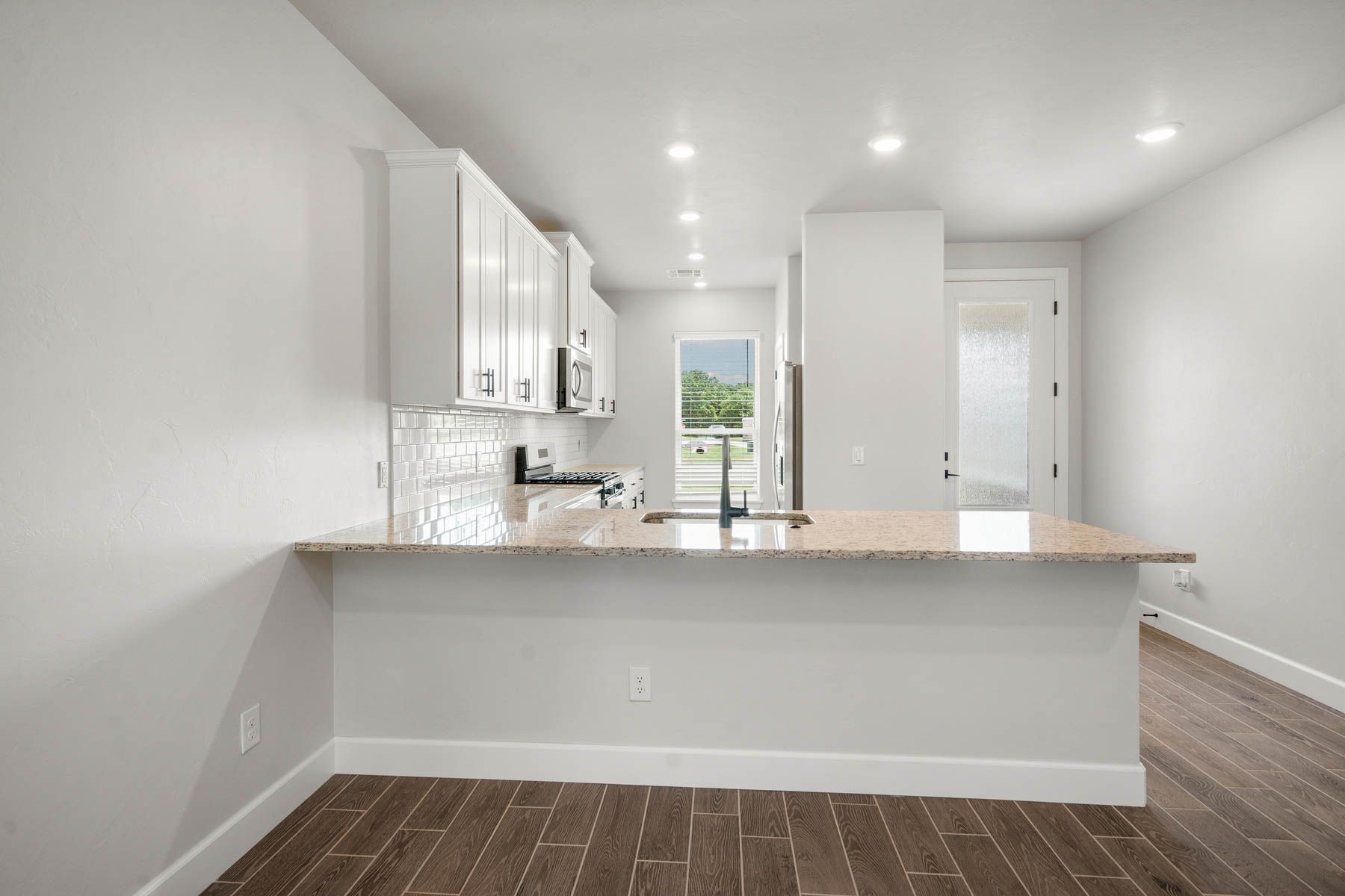 The kitchen has a window that allows in great, natural light.