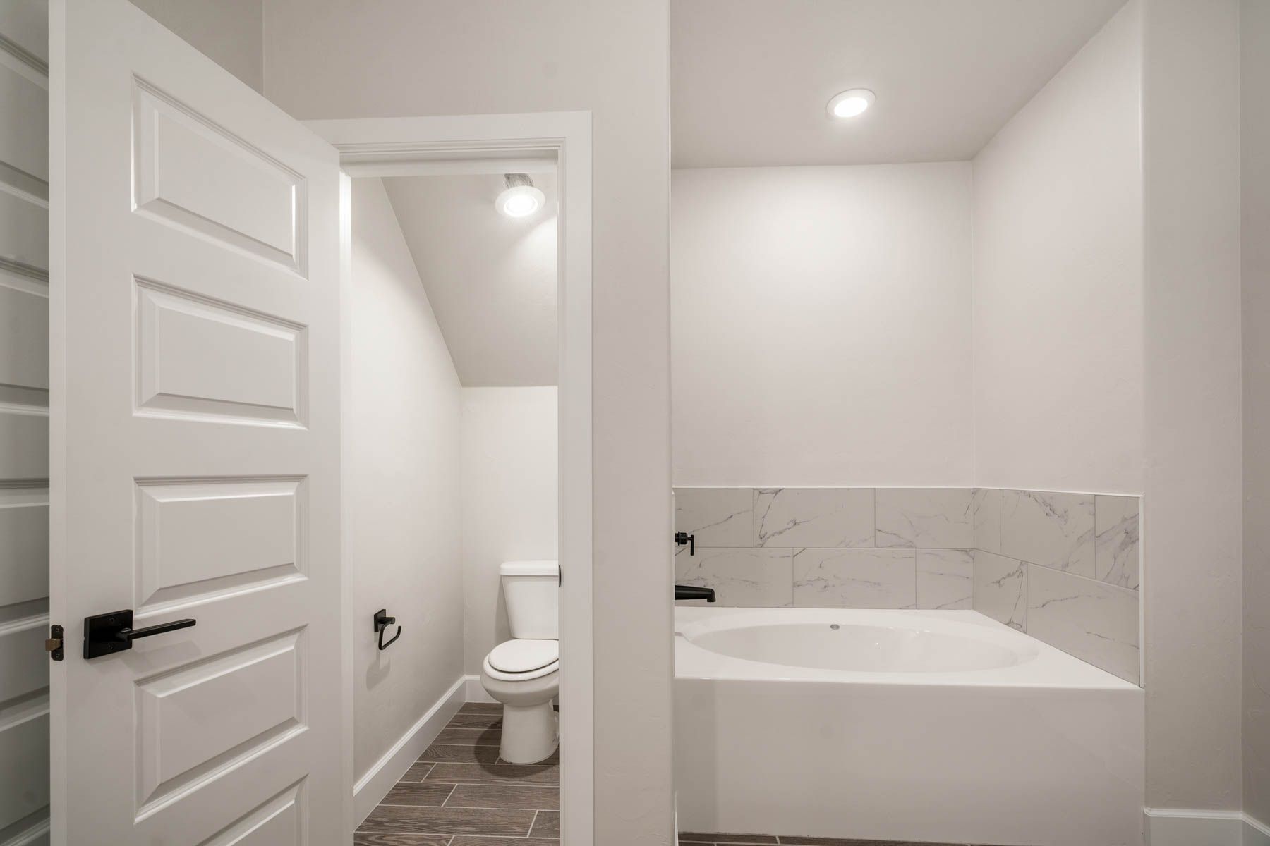 The master bathroom has a large garden tub.