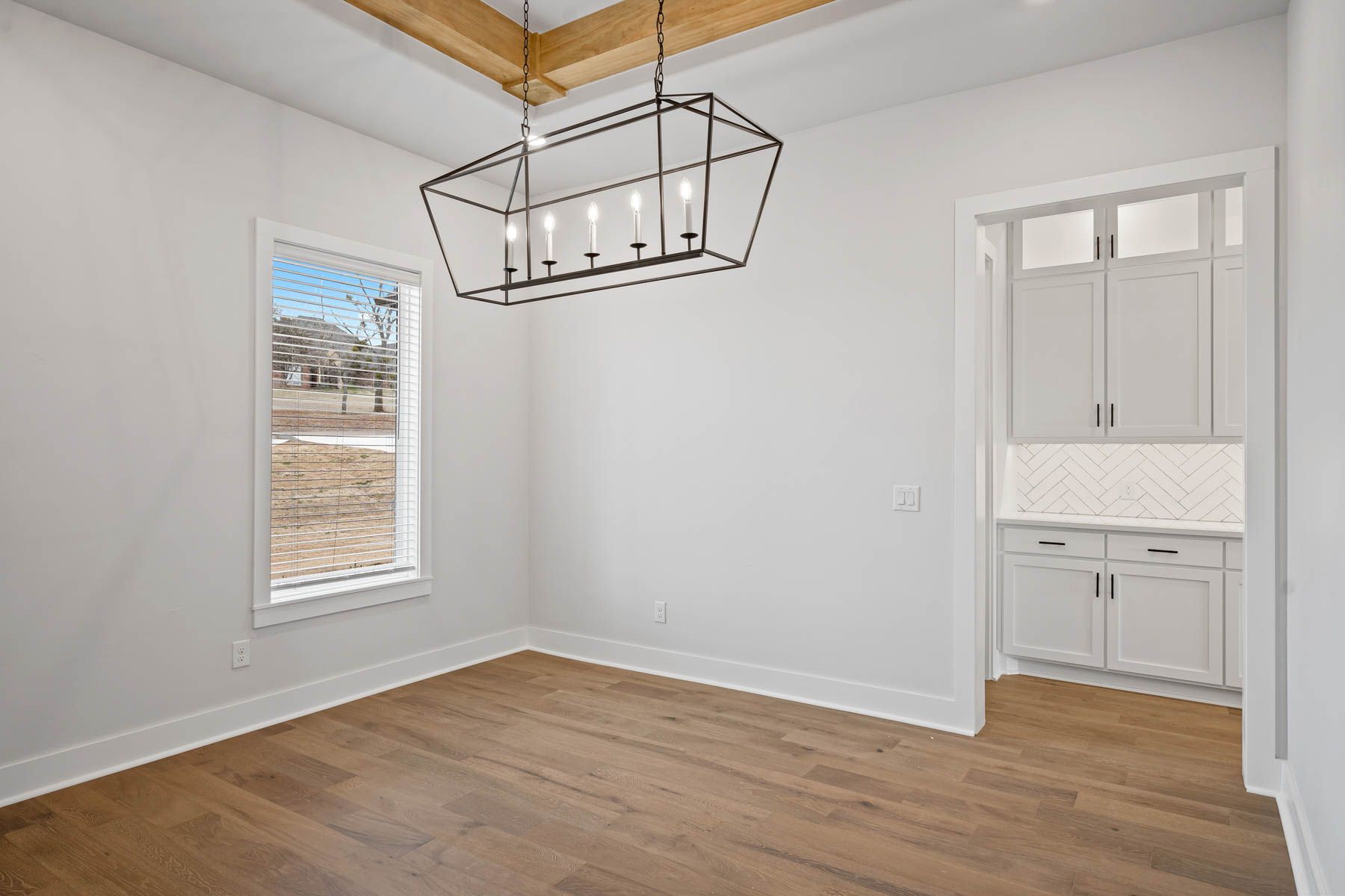 The dining room of the Hefner has a large window that lets in great, natural light.