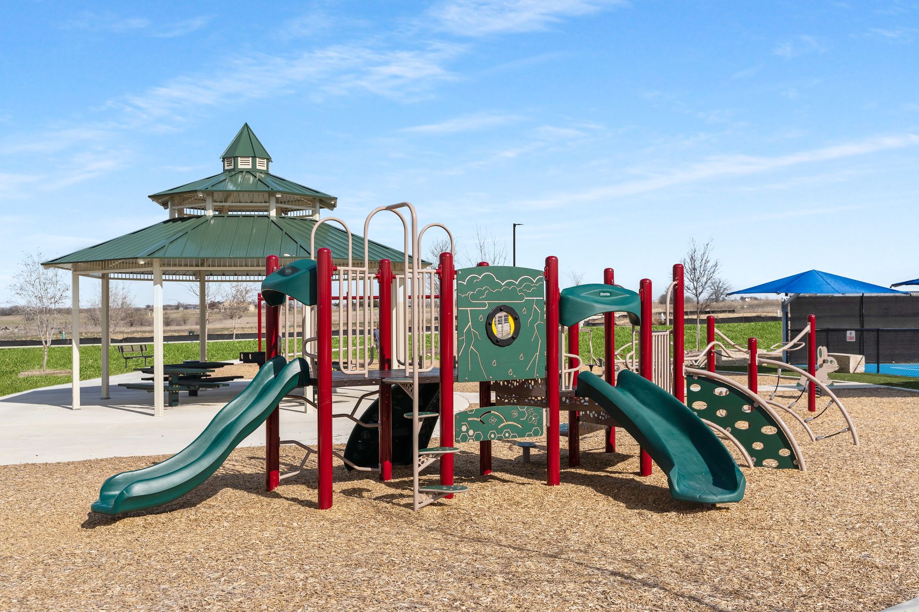 The community park includes a children's playground.