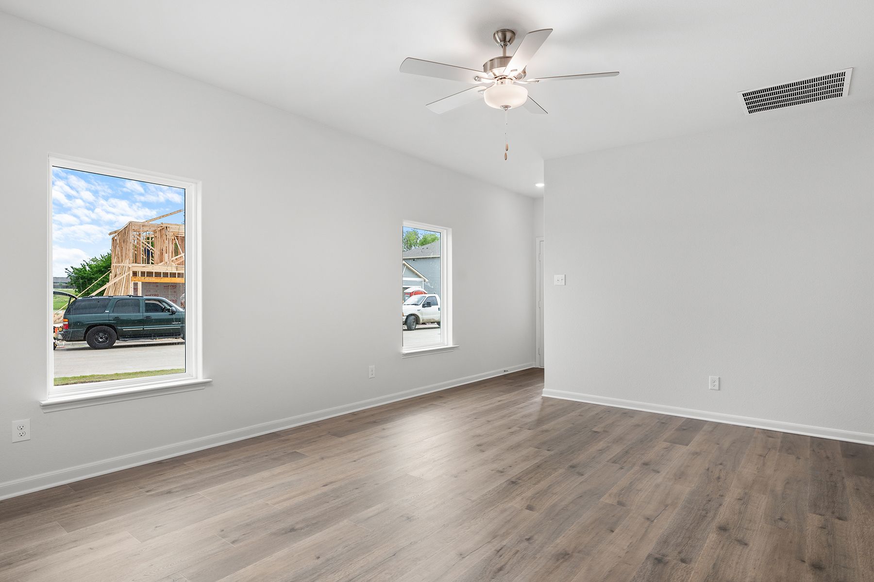The family room has plenty of windows that let in great, natural light.