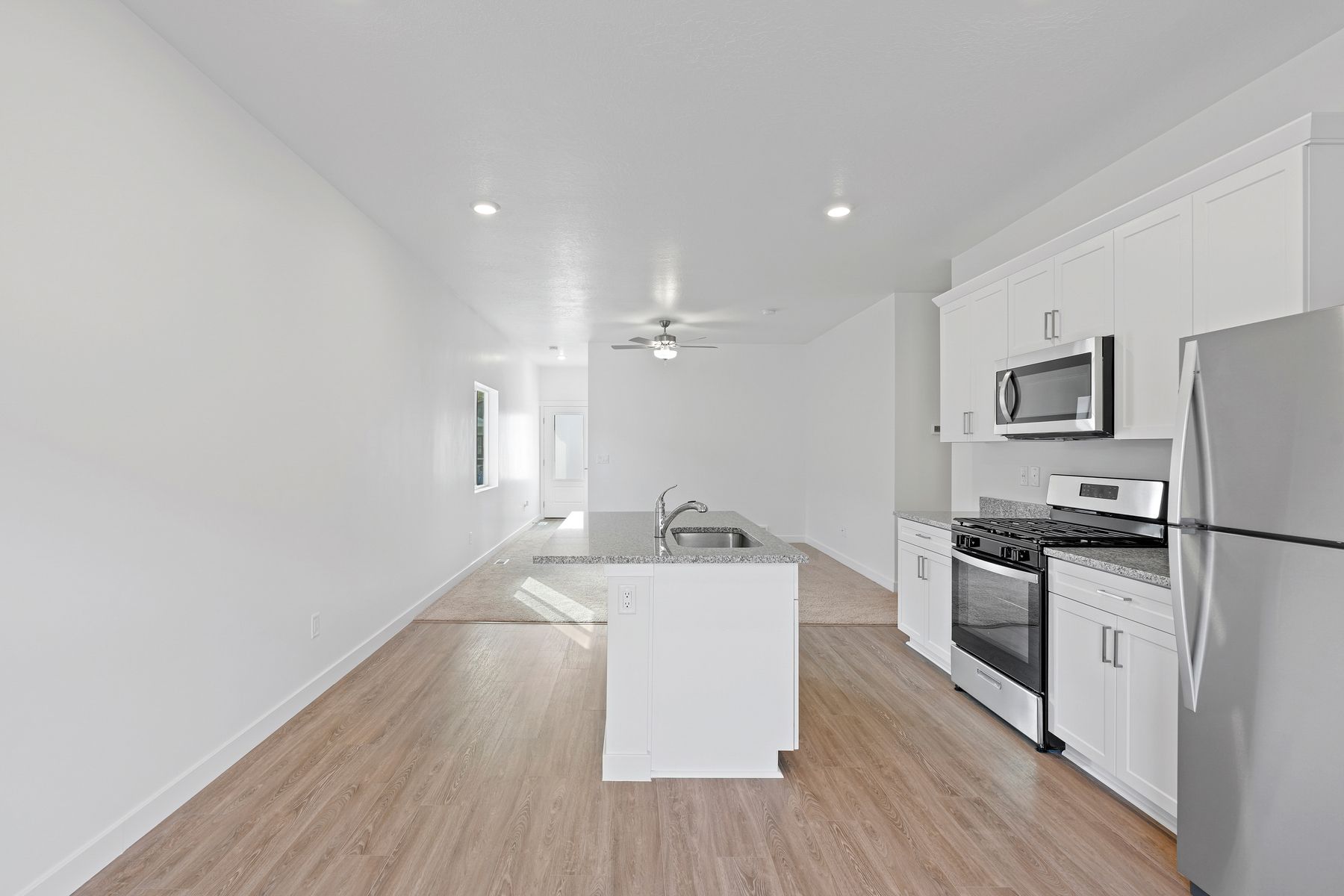 The kitchen connects to the dining area and family room.