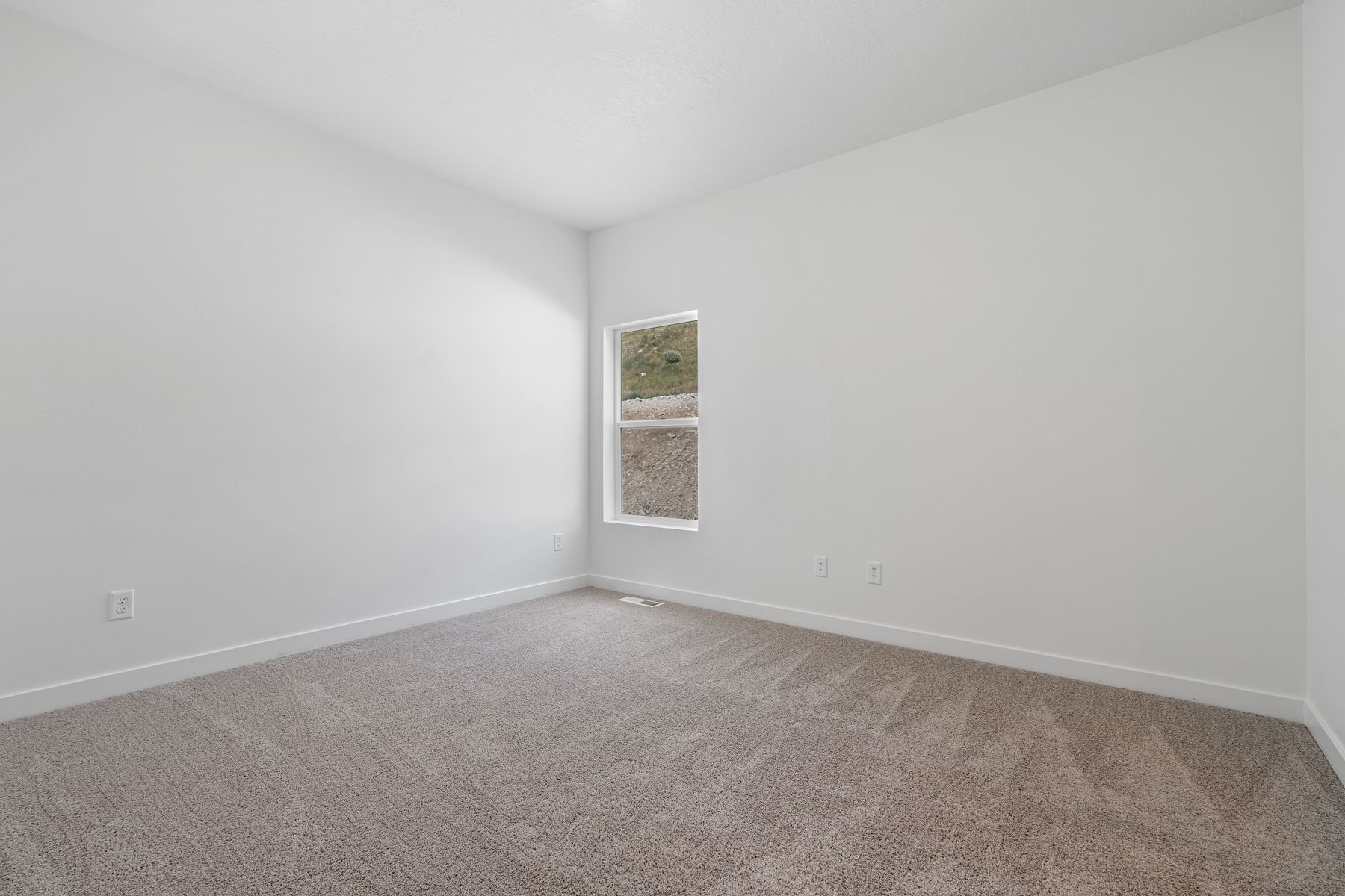 The spacious master bedroom has plenty of space for all of your furniture