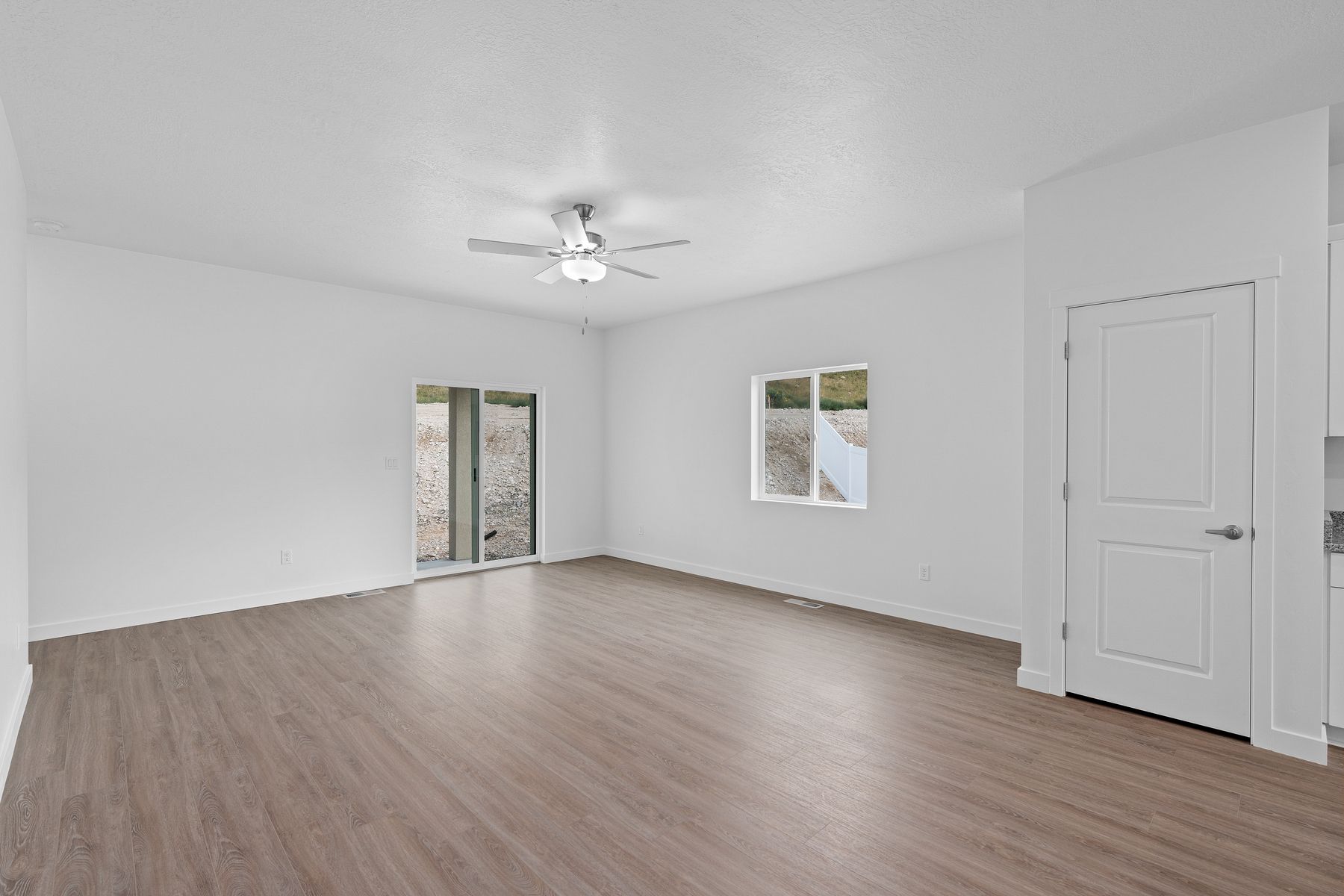 This spacious family room offers plenty of bright, natural light