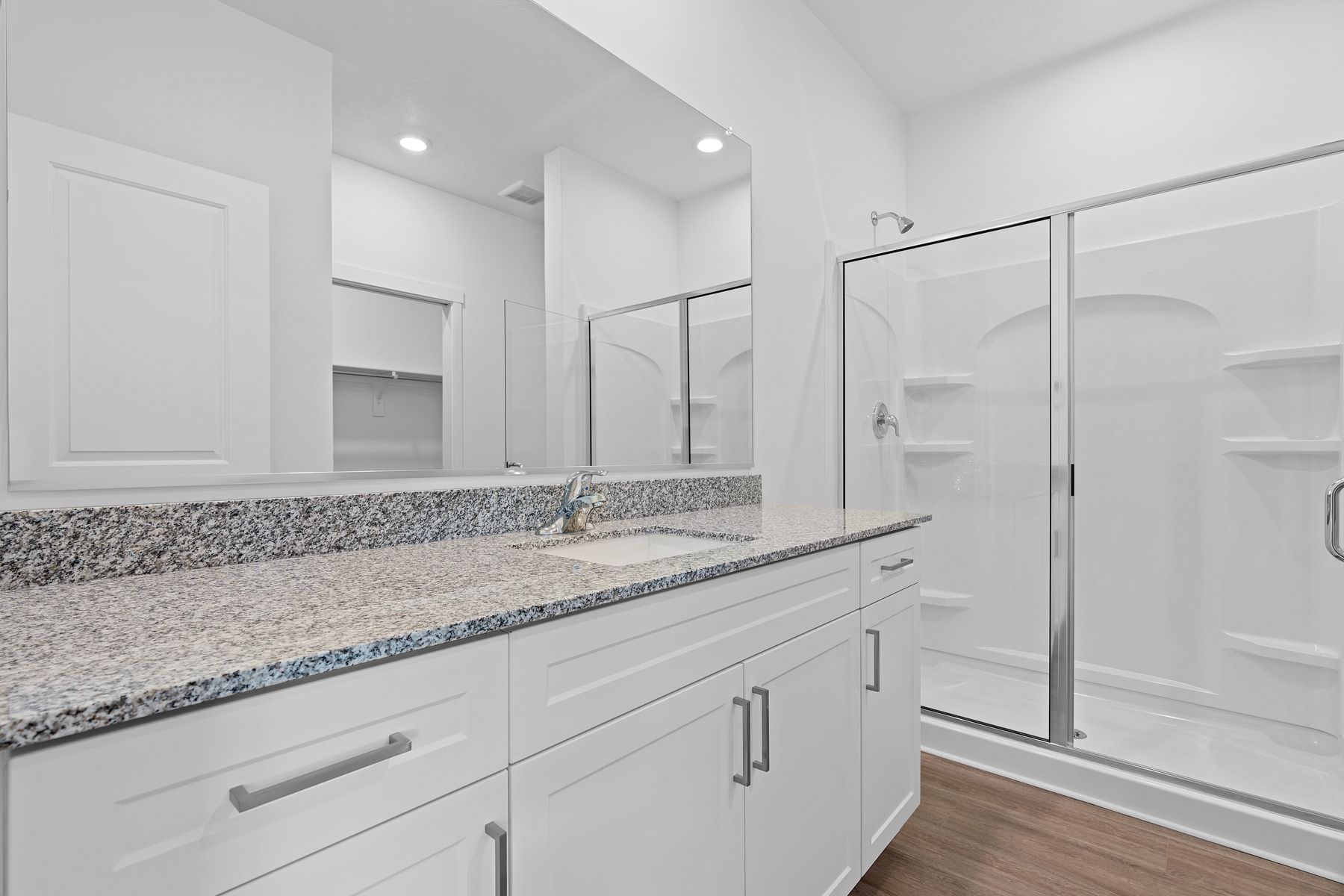 The beautiful master bathroom has plenty of space to get ready in the morning