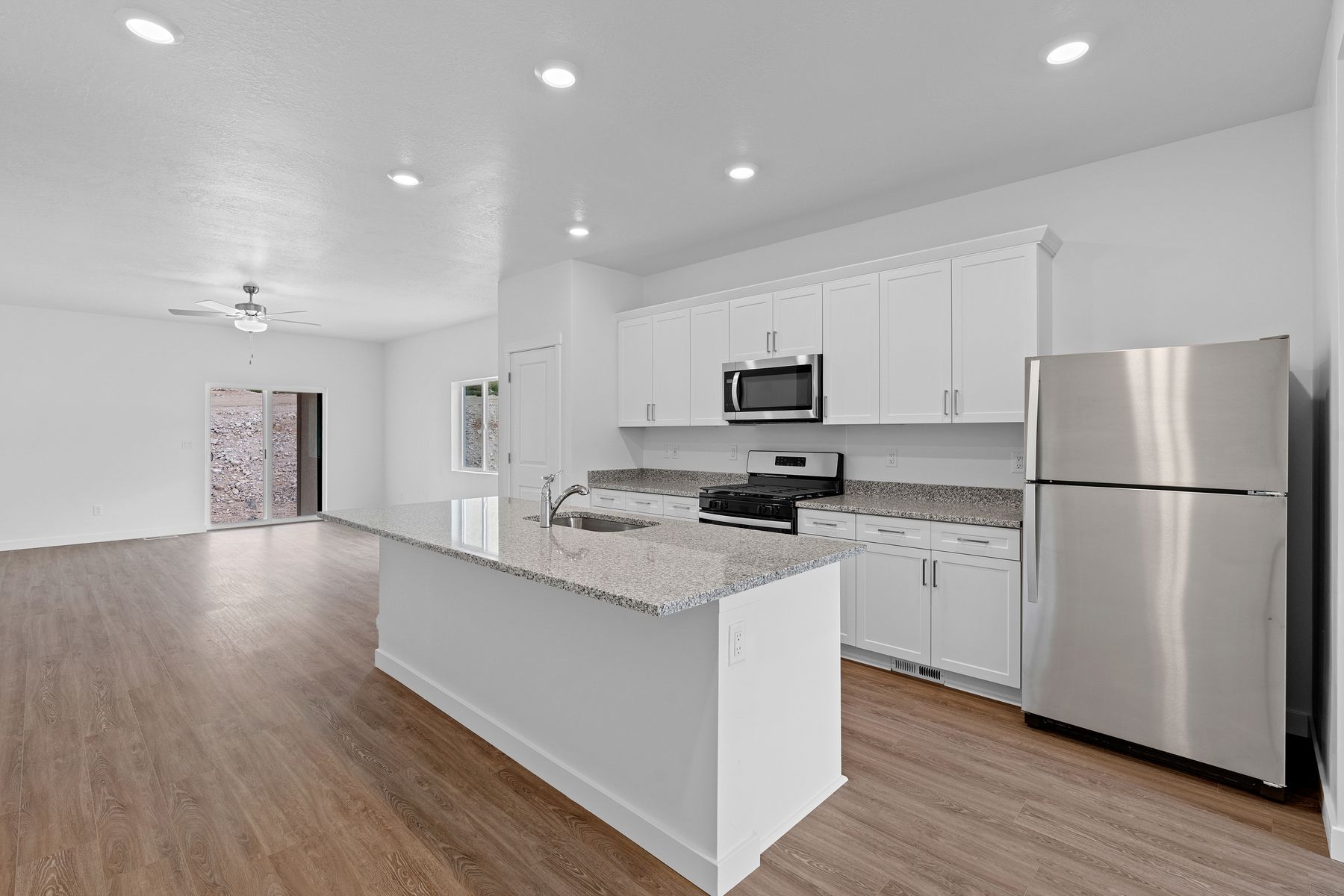 The kitchen has energy-efficient, stainless-steel appliances.
