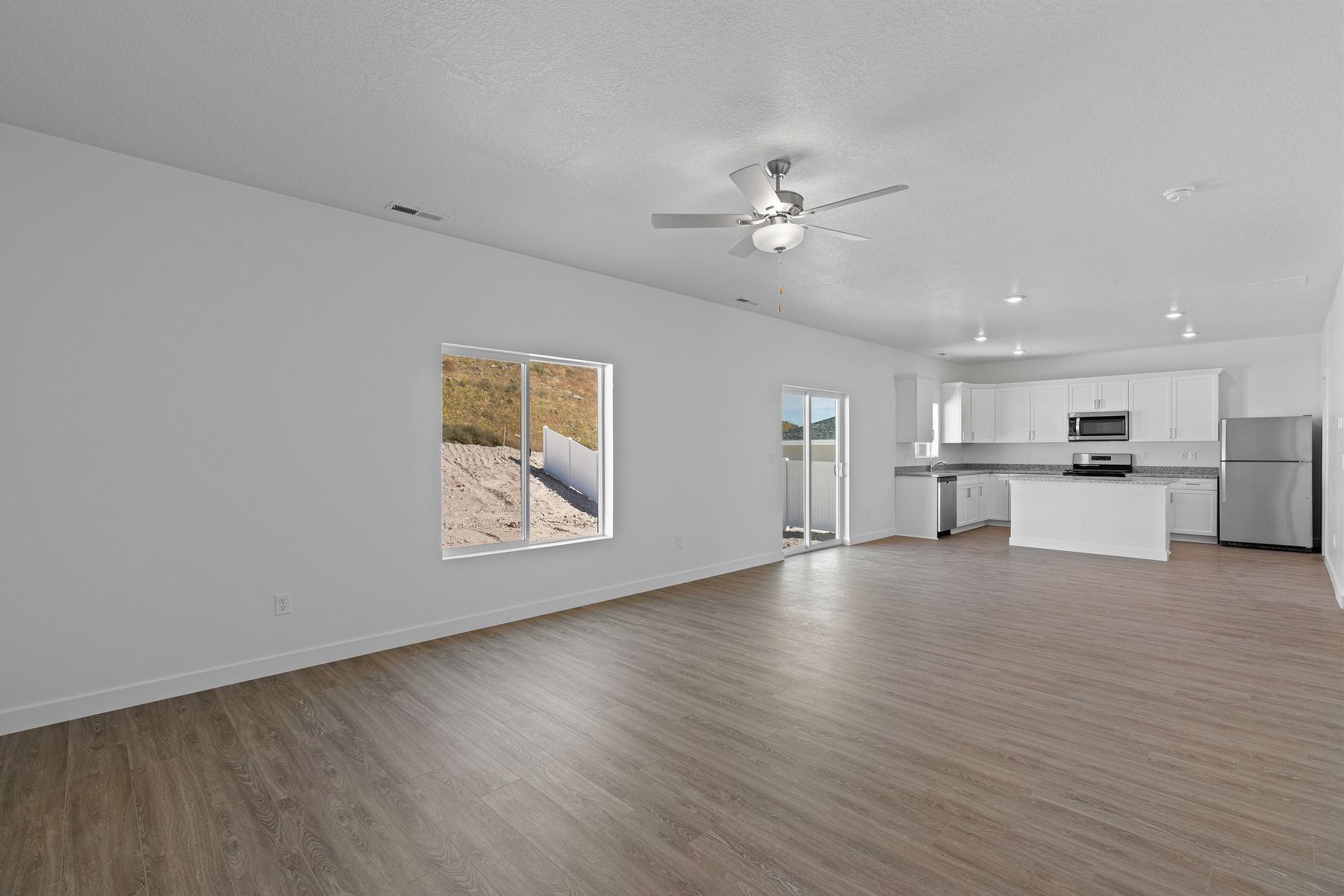 The family room sits adjacent to the dining area and kitchen.