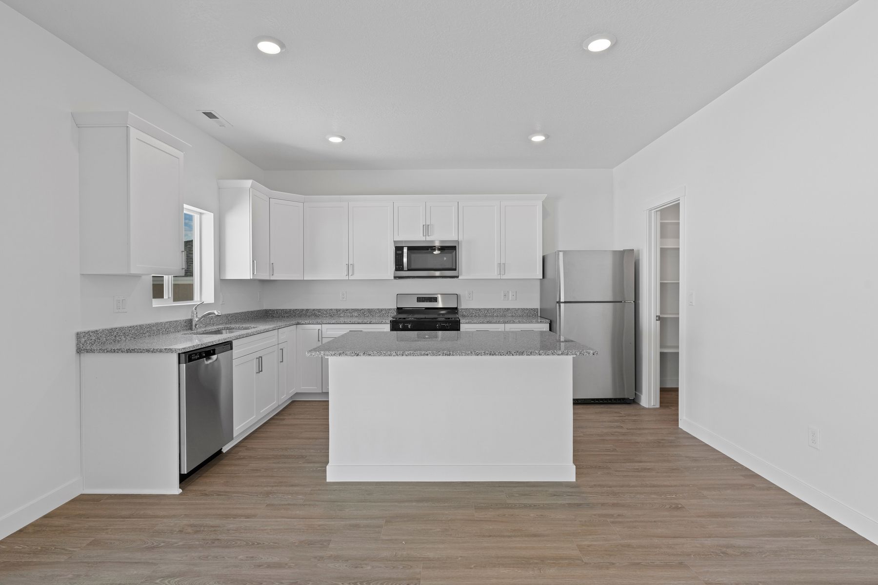 The kitchen has energy-efficient appliances.