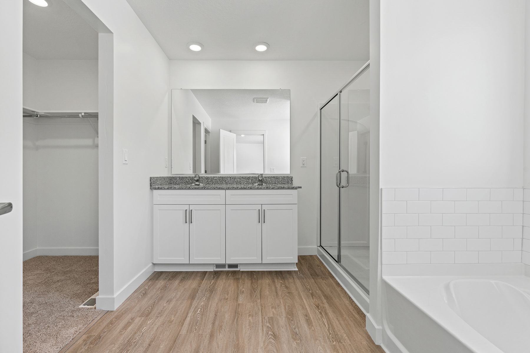 The master bathroom has a wonderful dual-sink vanity.