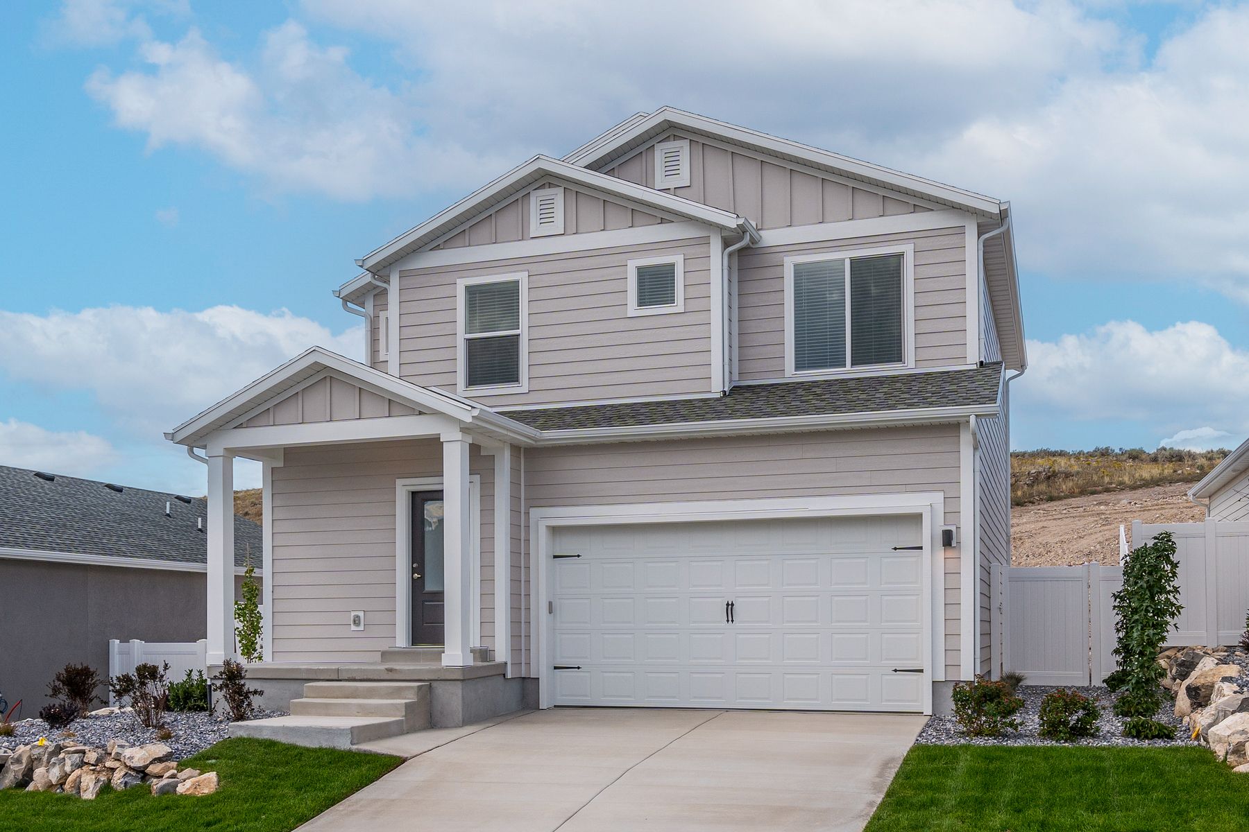 The Lewis has an attached two-car garage.