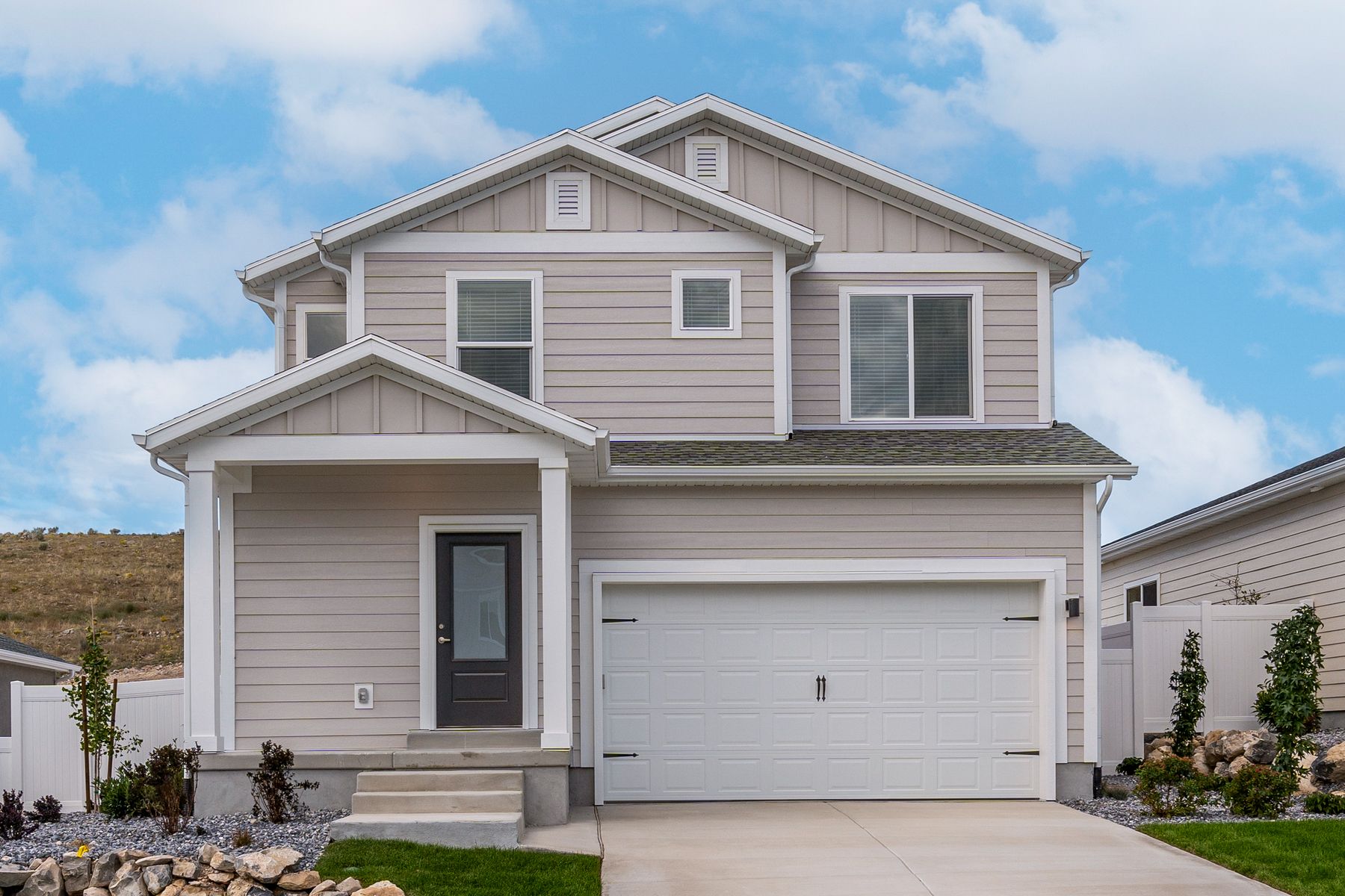 The Lewis is a beautiful two-story, siding home.