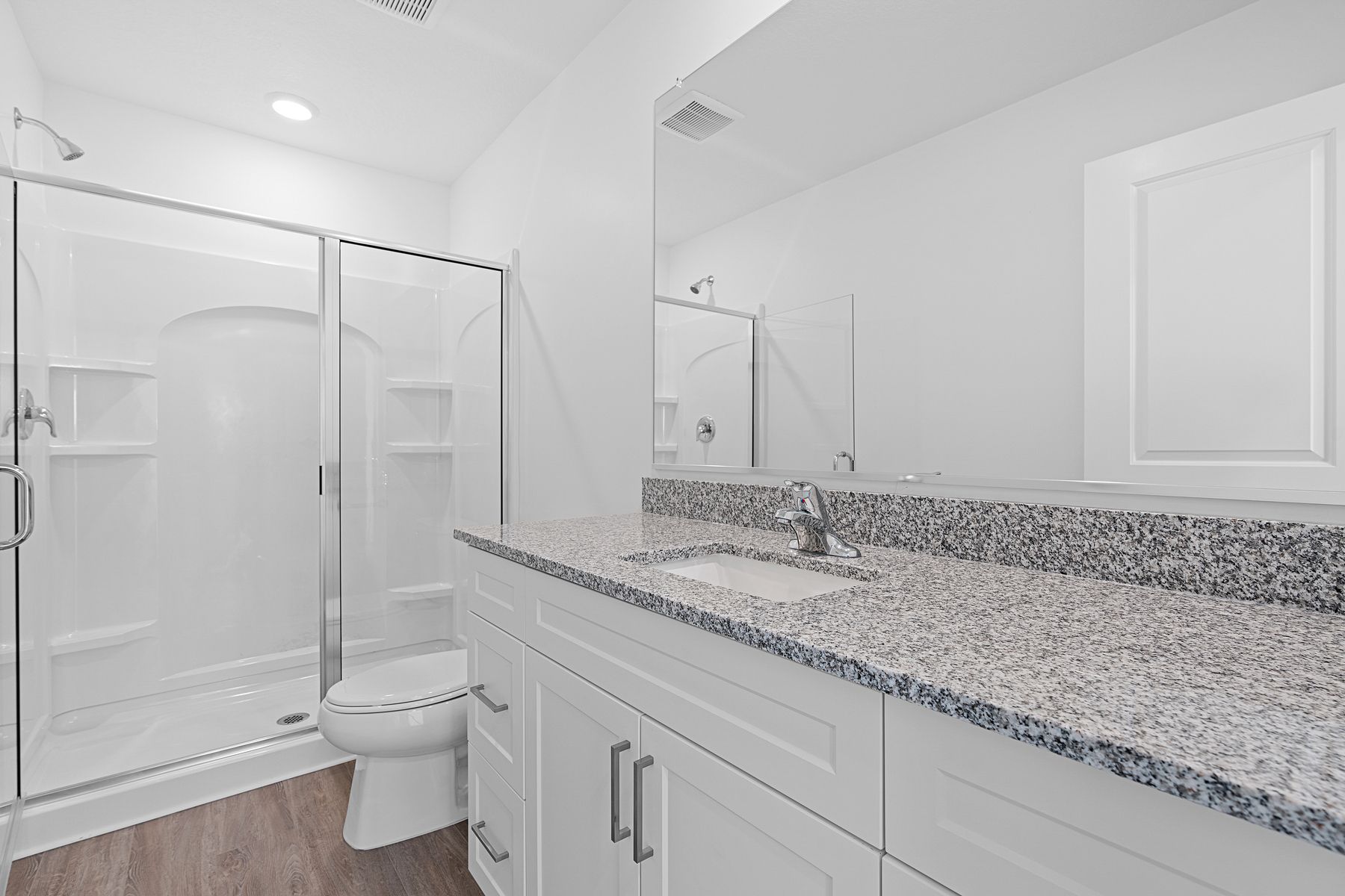 The master bathroom offers plenty of space to get ready in the mornings