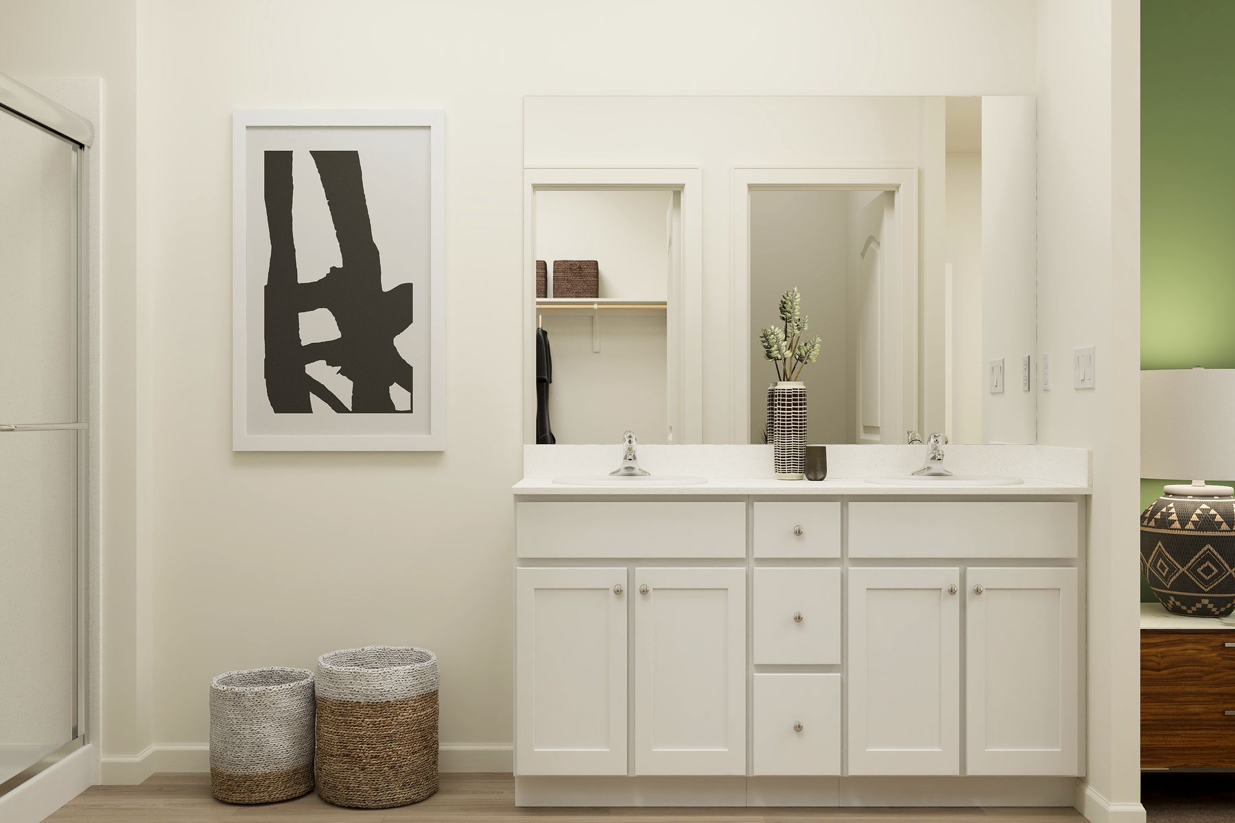 The master bathroom has a dual sink vanity and a step in shower.