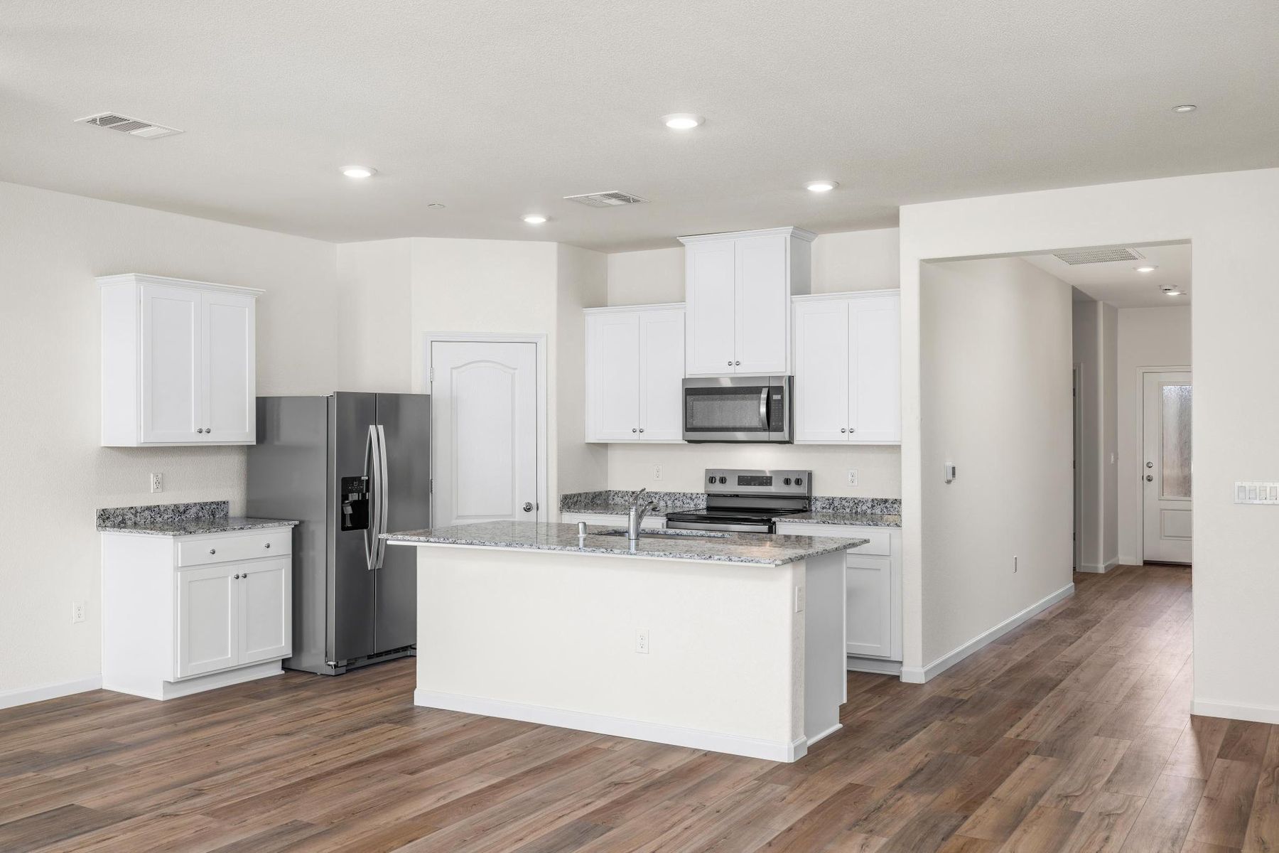 The kitchen appliances come included in this home.