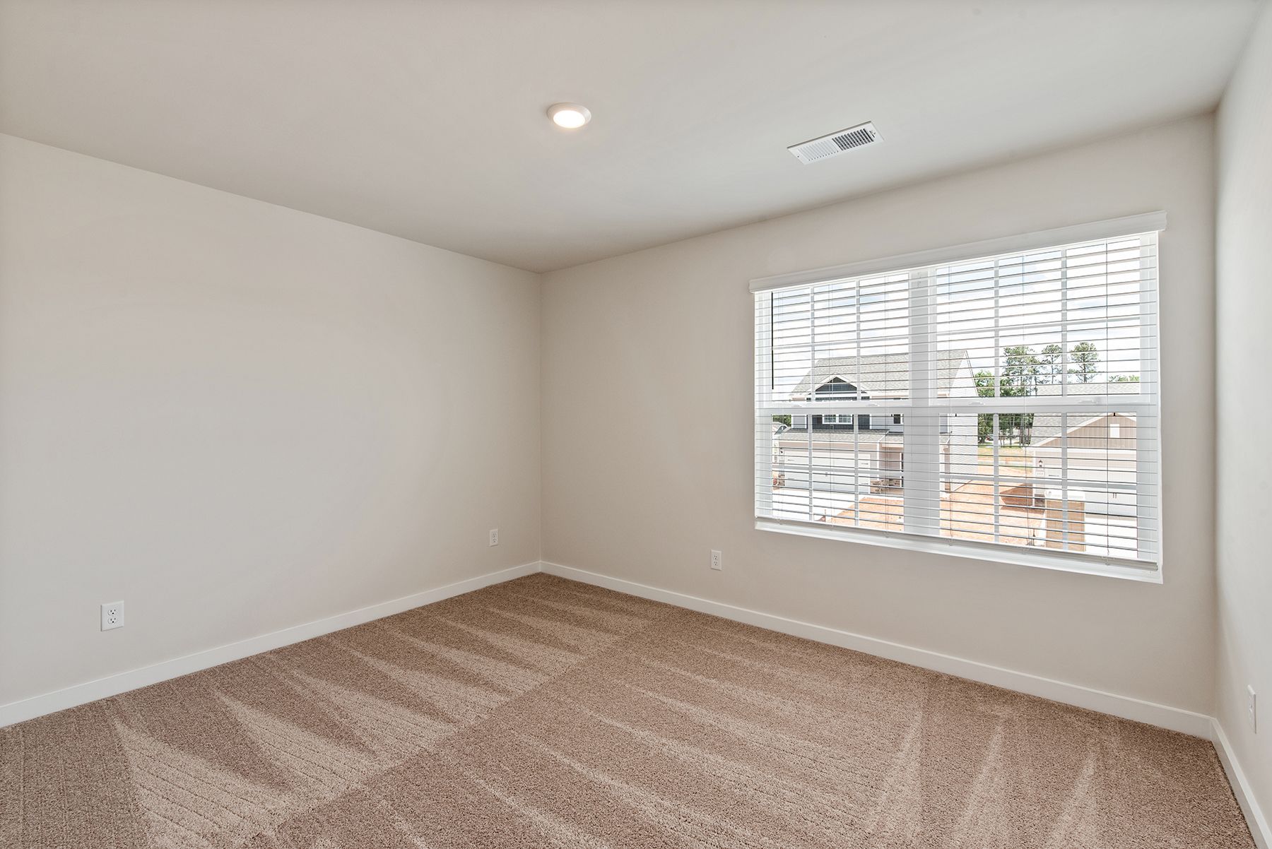The master bathroom has a glass-enclosed shower