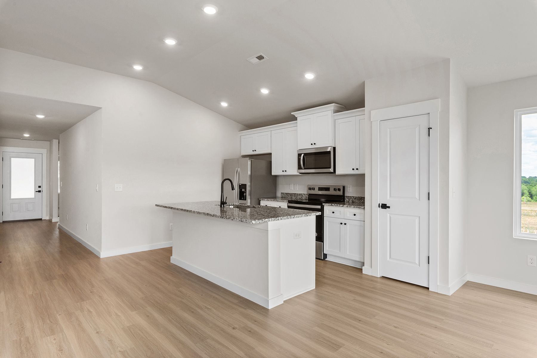 The kitchen has granite countertops