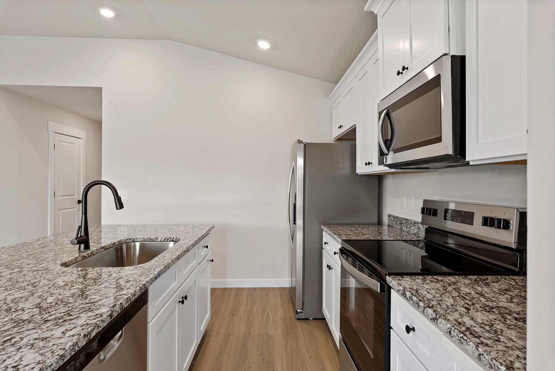 The kitchen has granite countertops