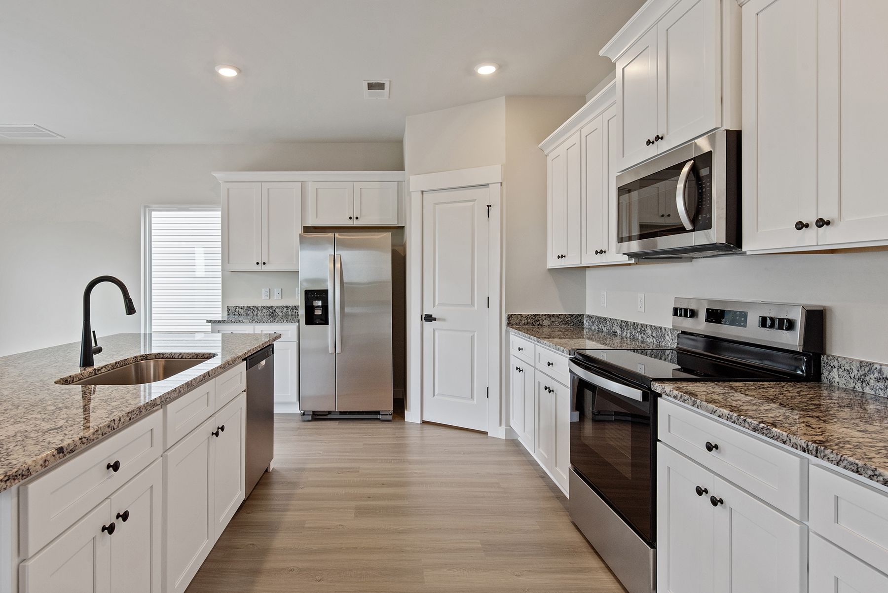 The kitchen is open to the living area