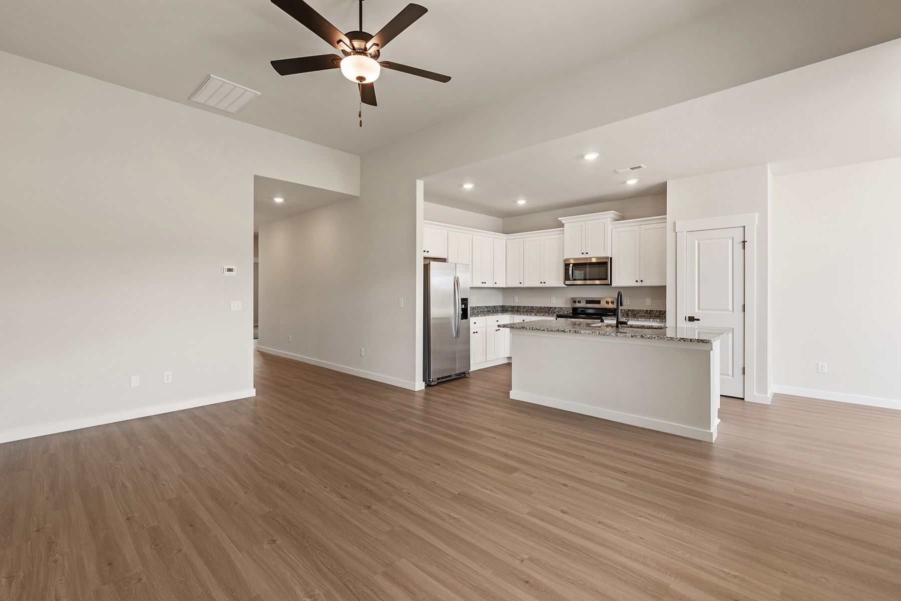 The kitchen has granite countertops