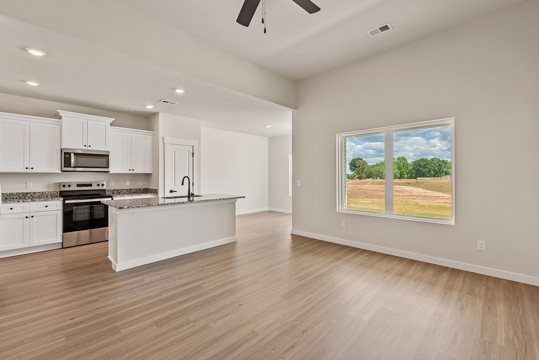 The kitchen opens to the living area