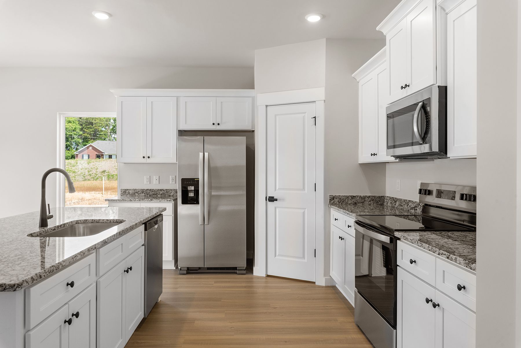 The kitchen has granite countertops