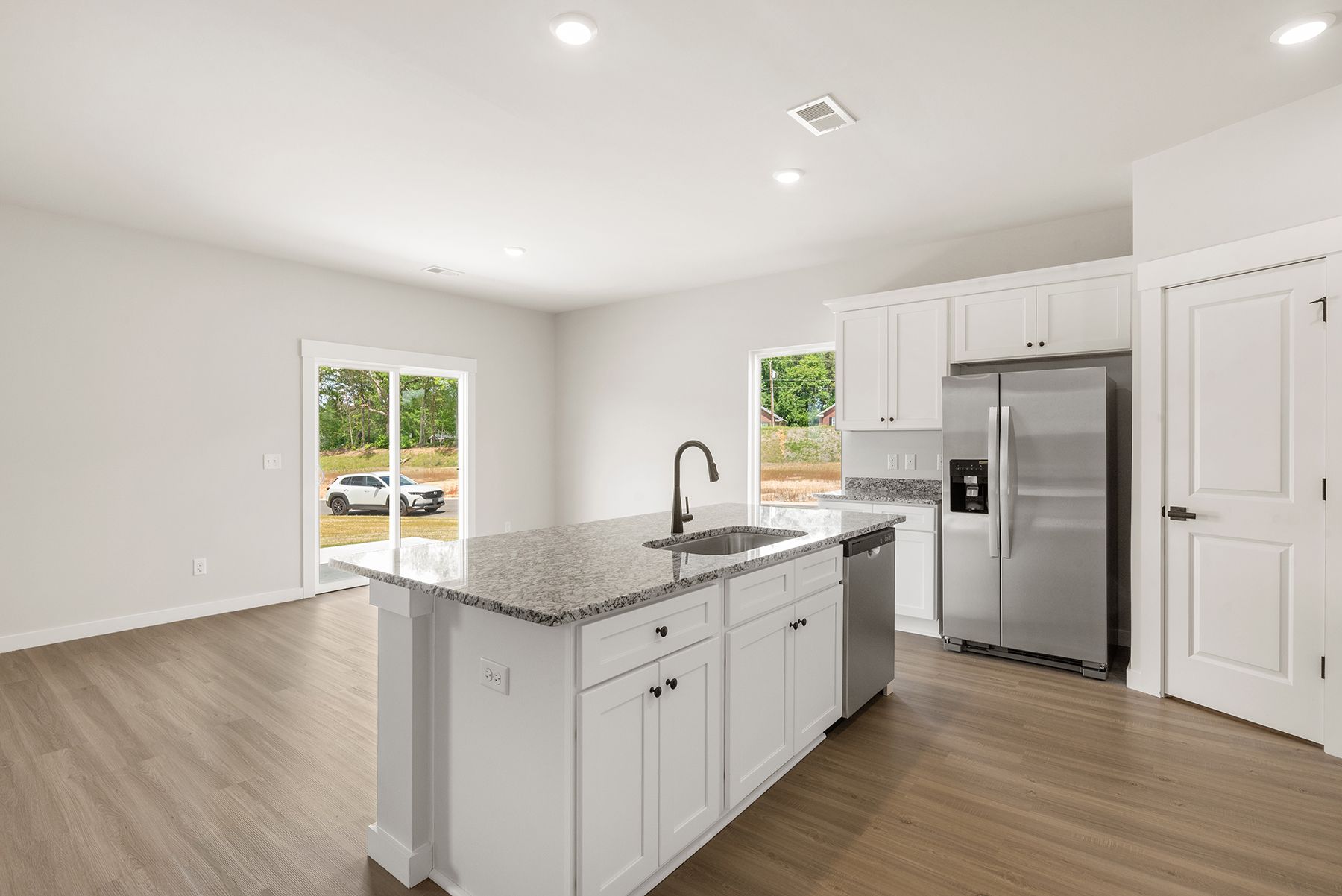 The kitchen overlooks the dining area