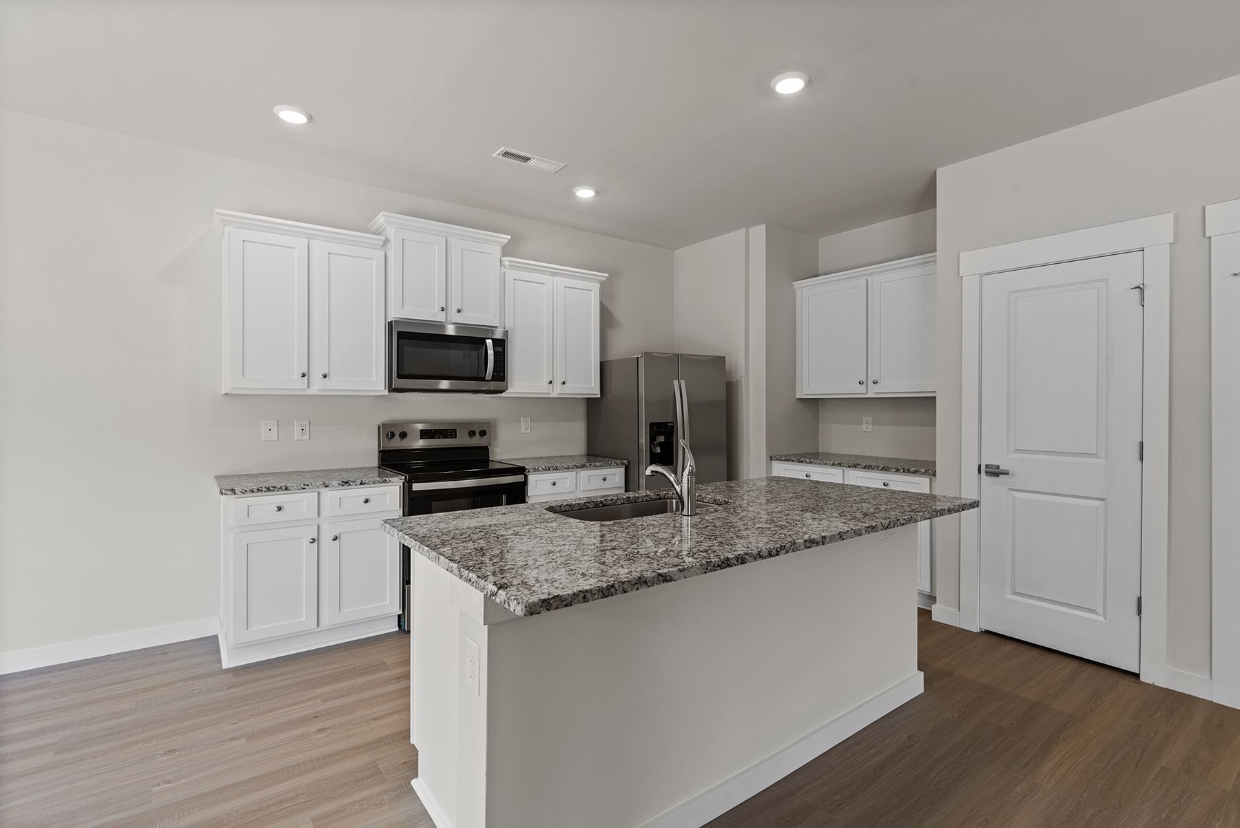 The kitchen has stainless-steel appliances