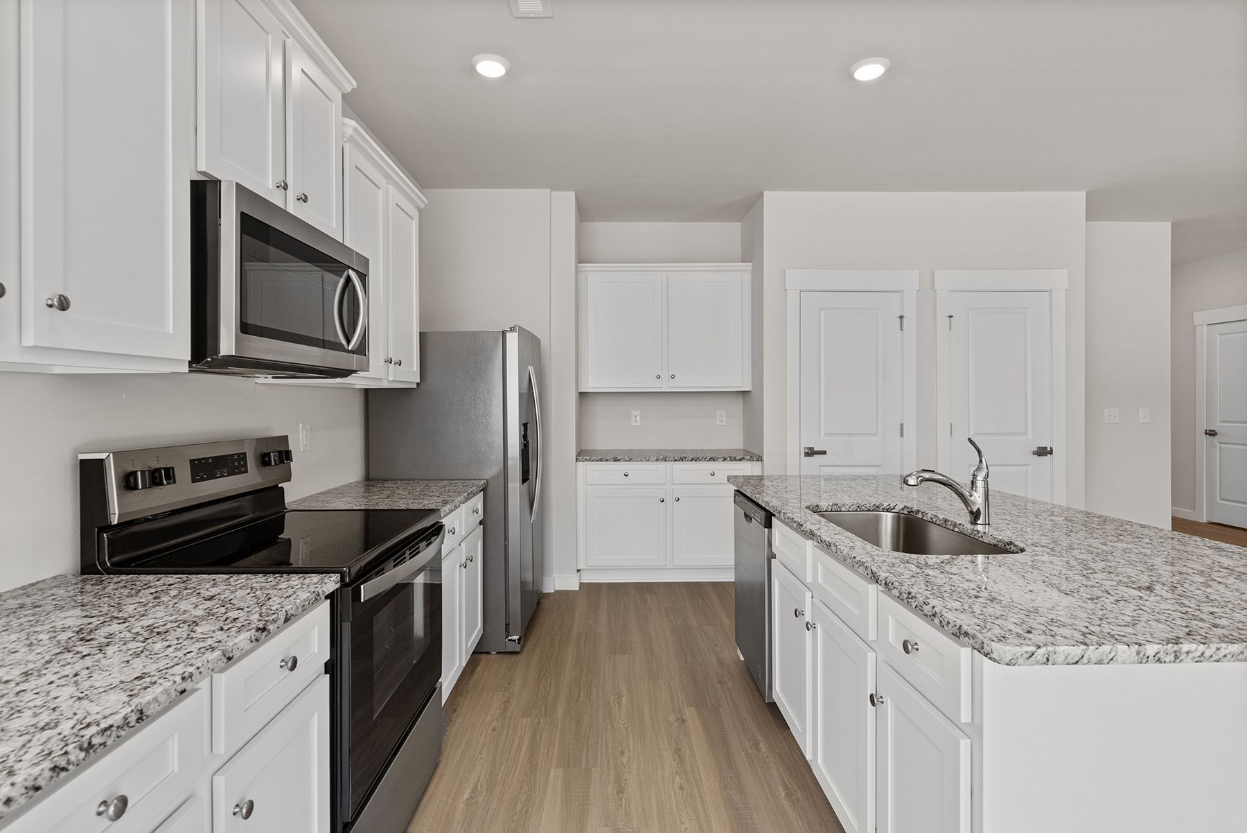 The kitchen has granite countertops