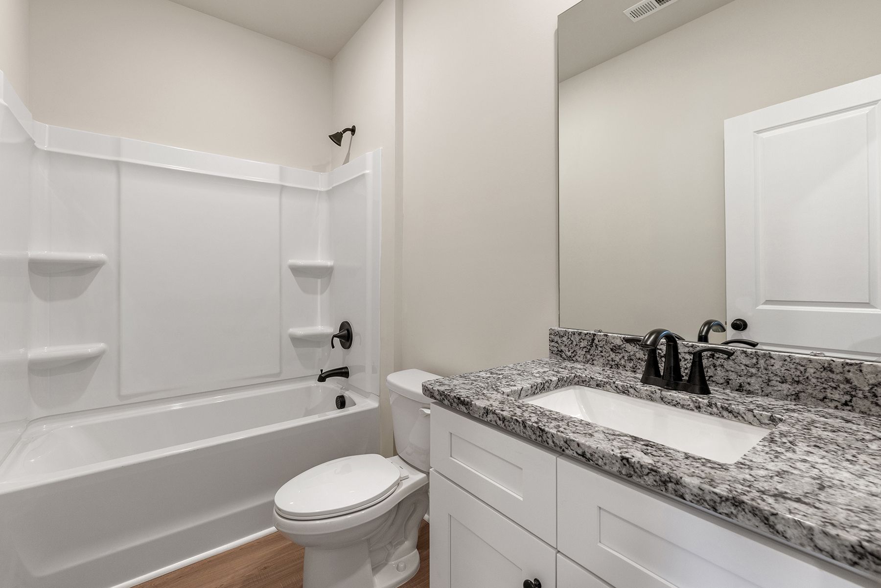This bathroom has a large bath tub
