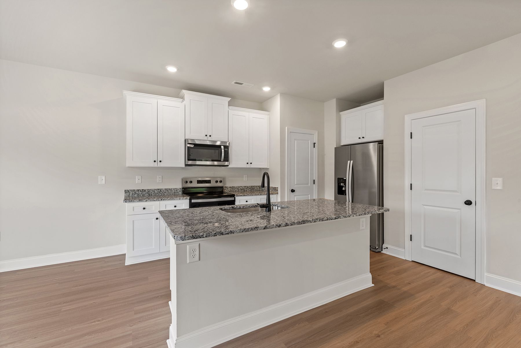 The Kitchen comes with brand new stainless steel appliances