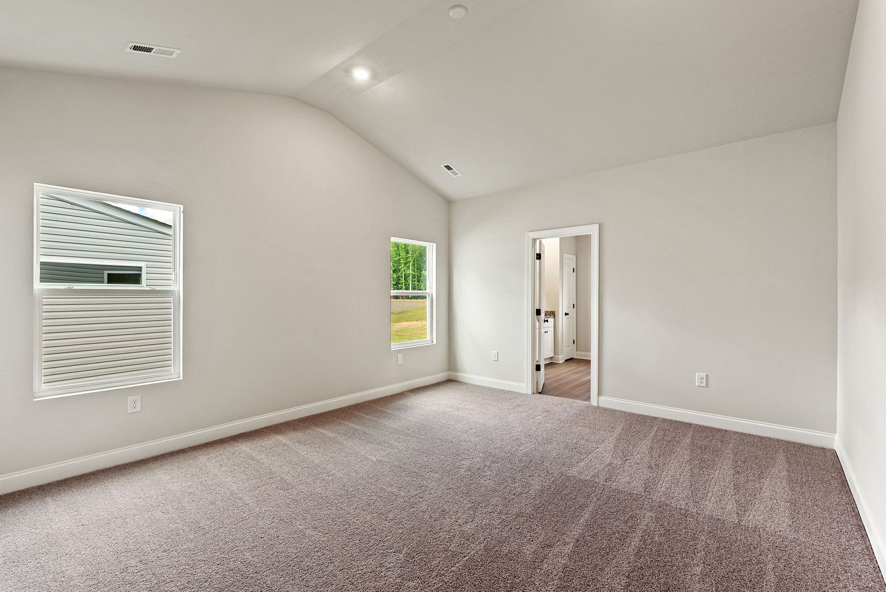 The master bedroom has enough space for your king-sized furniture.