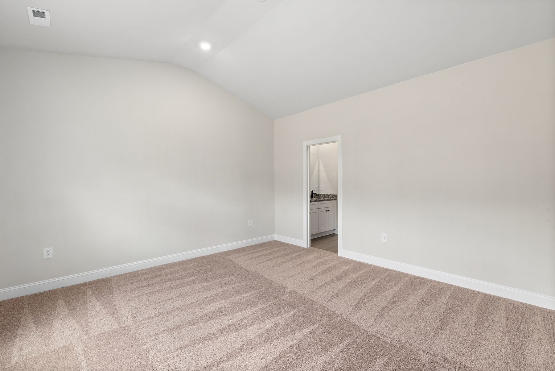 The master bedroom has enough space for your king-sized furniture.
