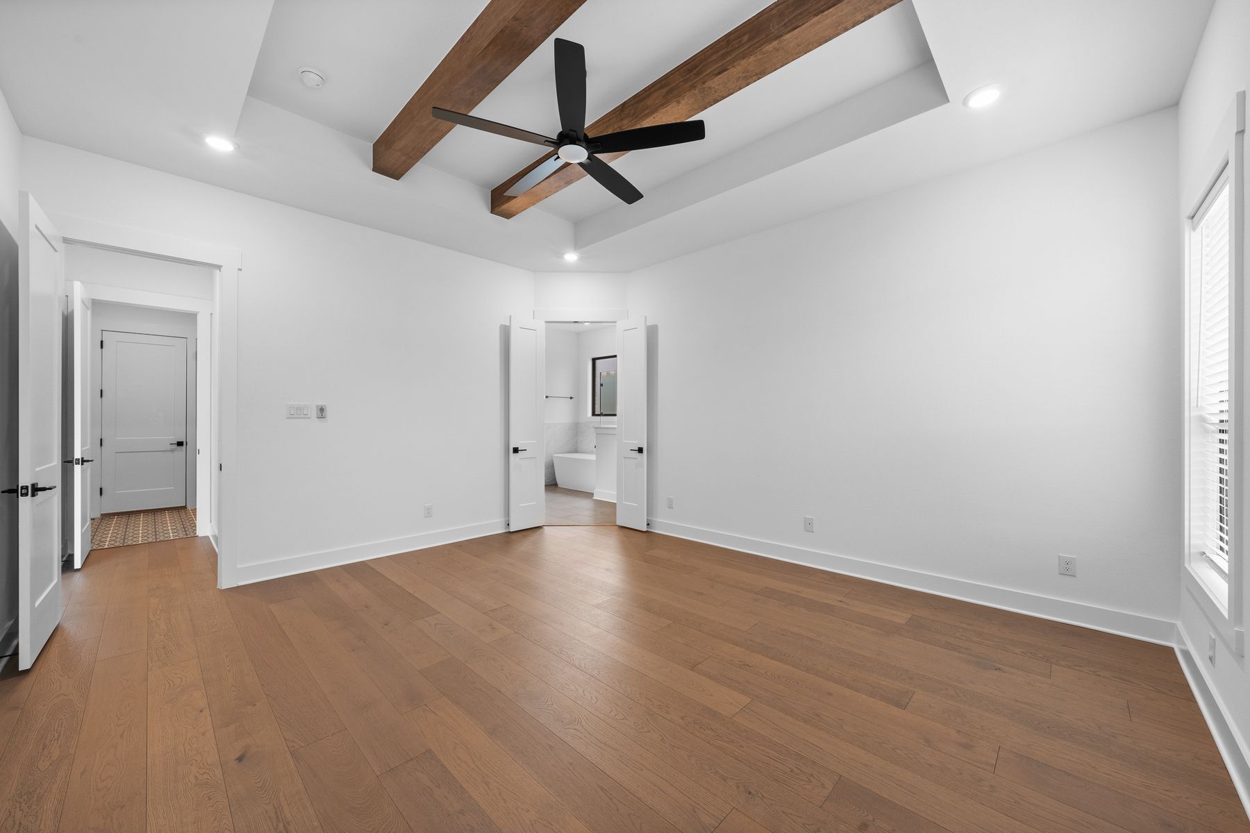 The peaceful master suite has a large bedroom, spa-like bathroom and giant walk-in closet.