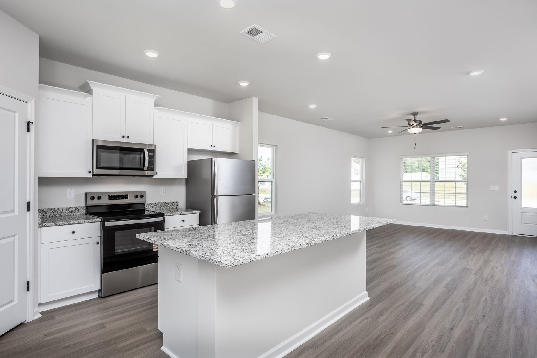 The kitchen has granite countertops.