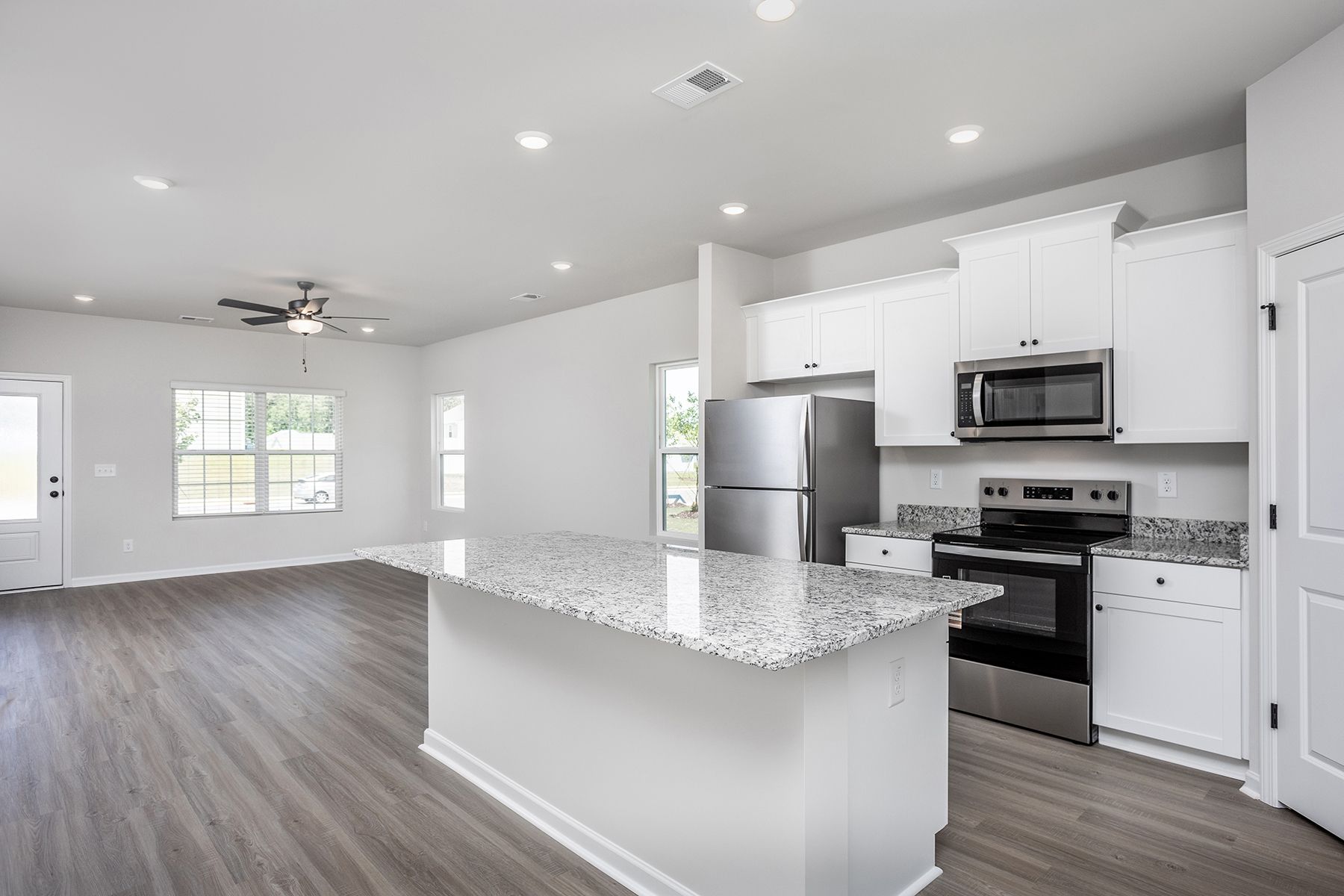 The kitchen overlooks the dining area