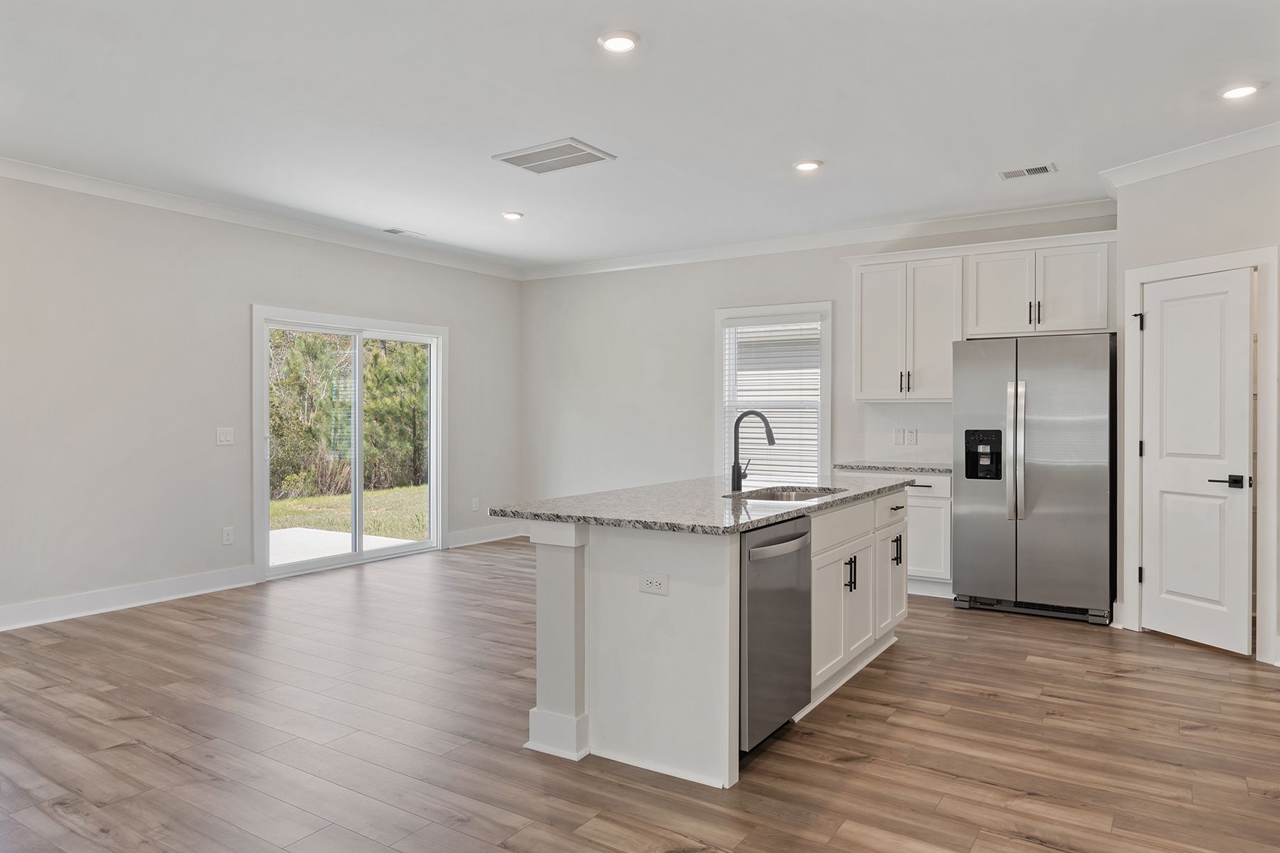 The kitchen overlooks the dining area