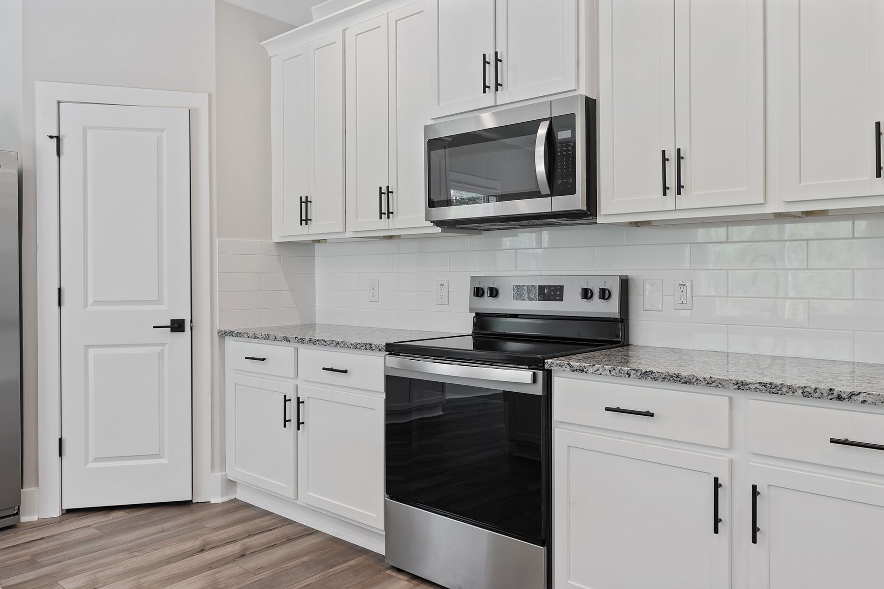 The kitchen has granite countertops