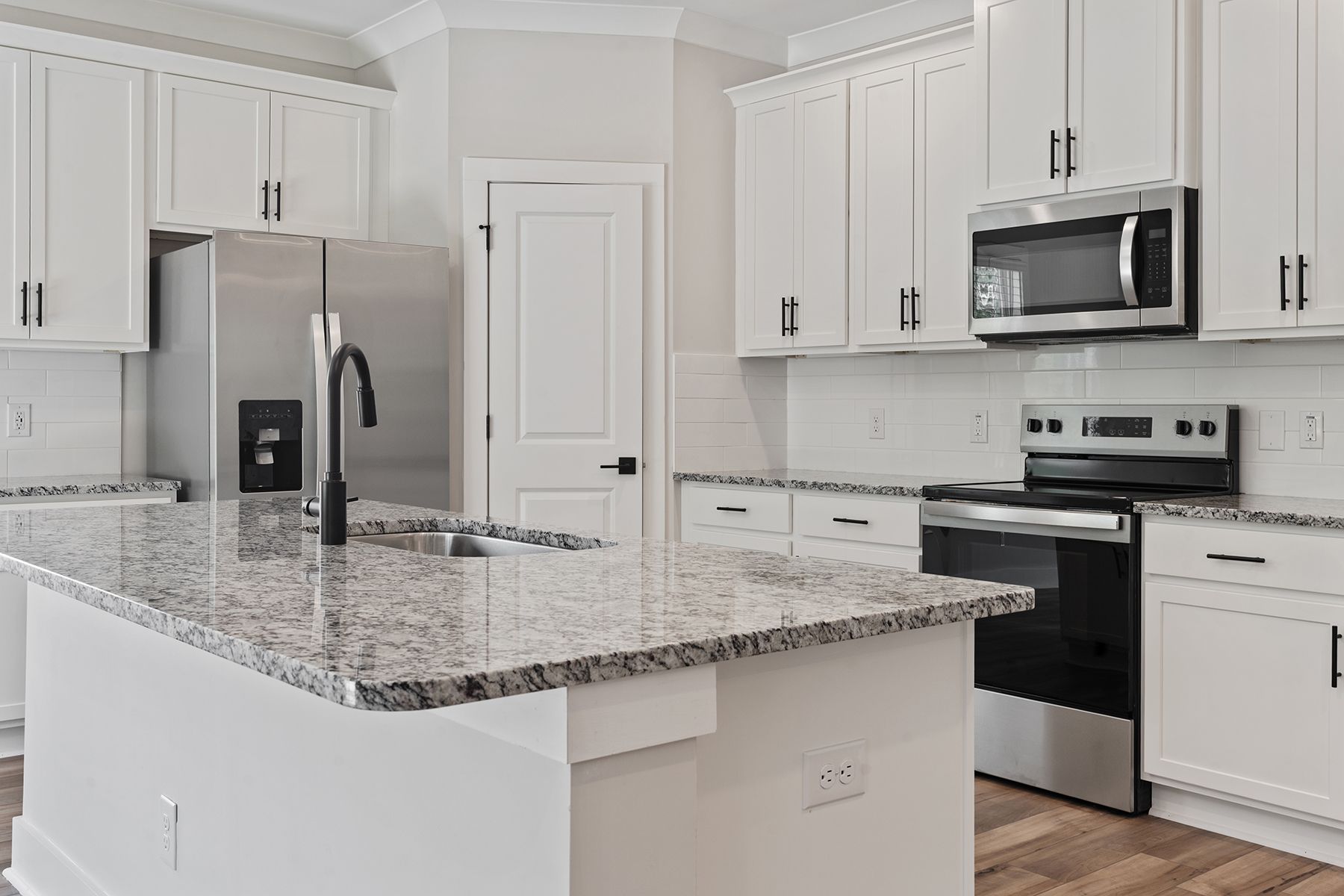 The kitchen overlooks the dining area