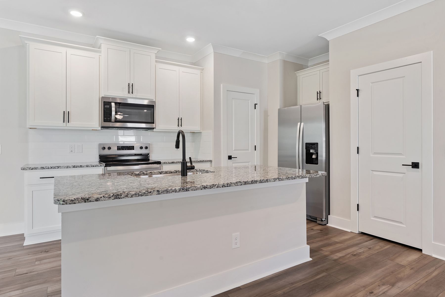 The kitchen comes with stainless steel appliances
