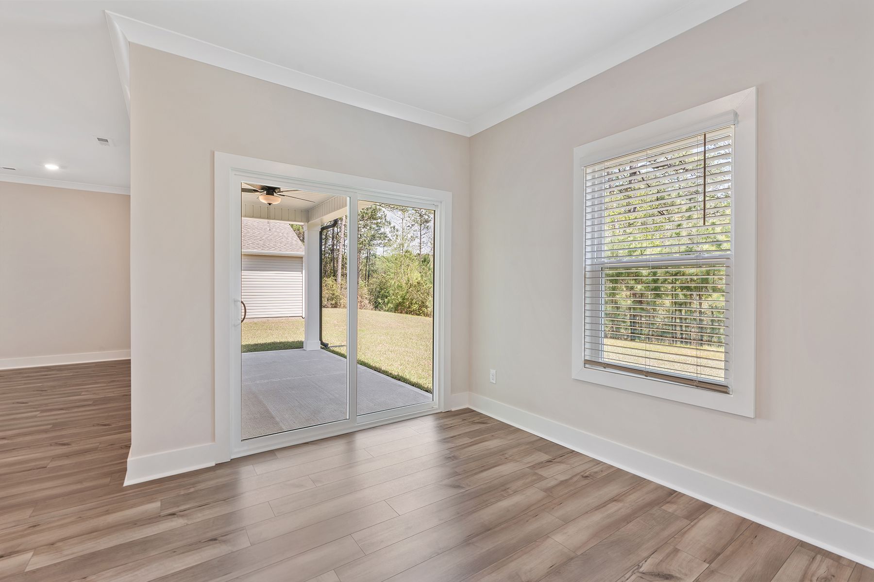 The dining room opens to the backyard