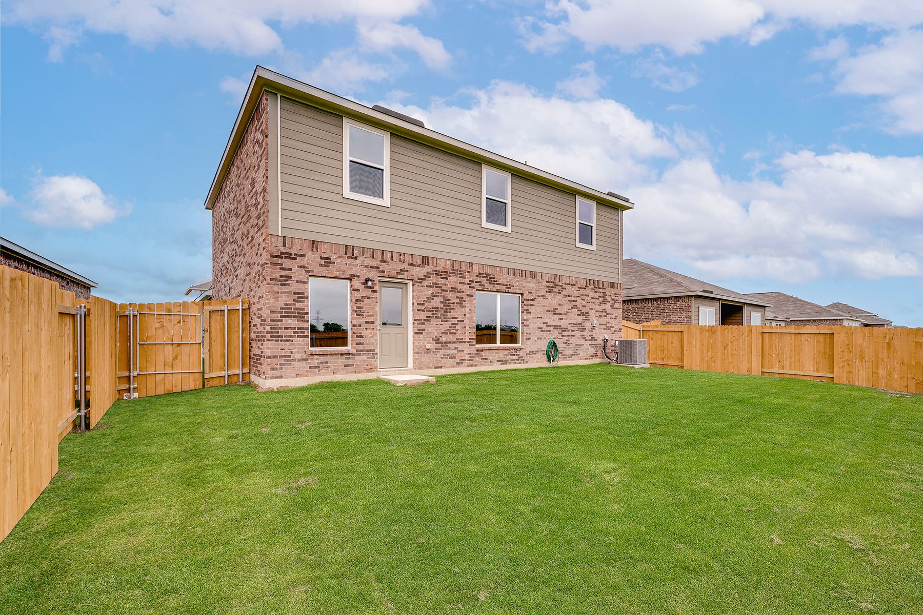 The back yard of the Cypress is fully fenced.