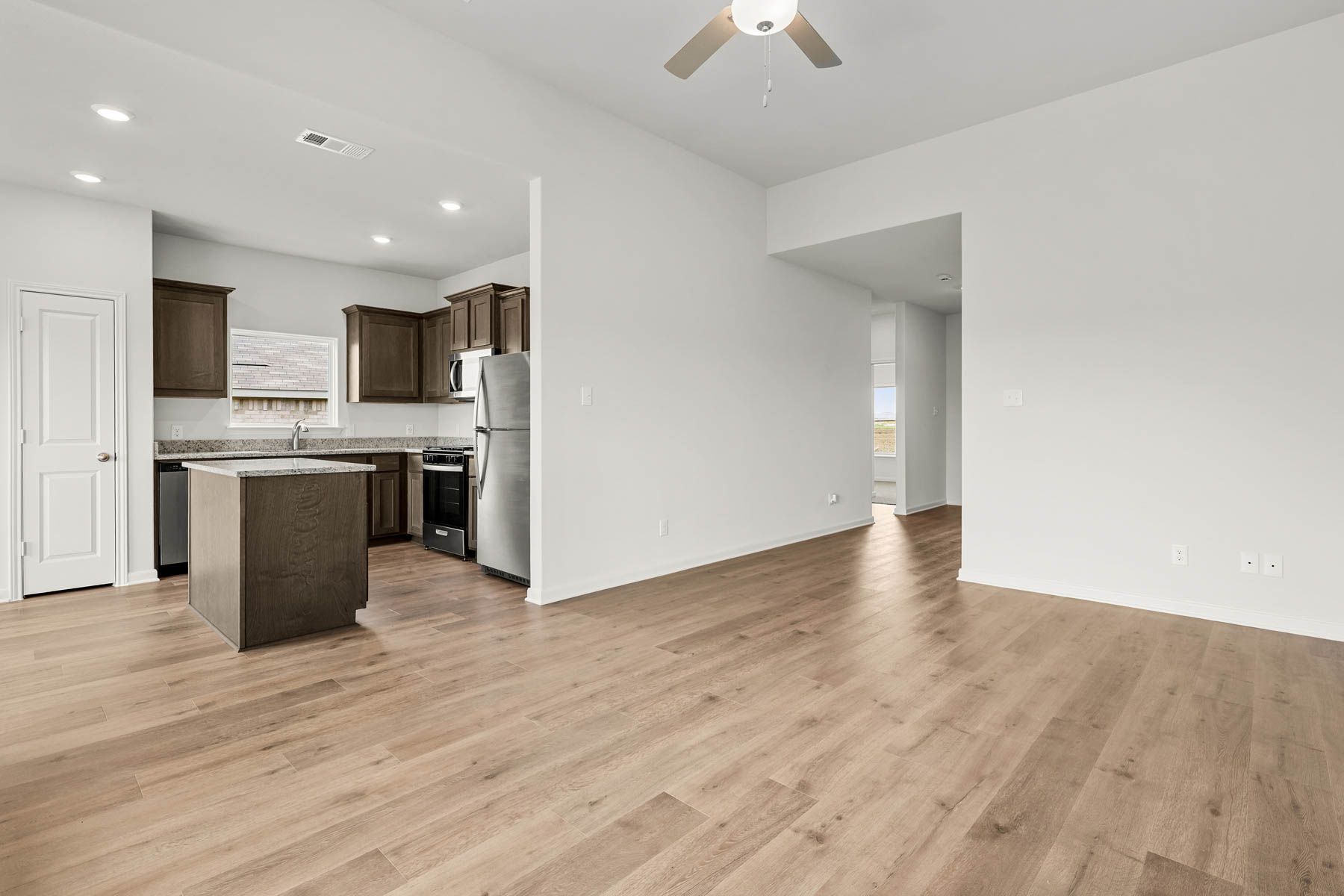 The family room sits right off of the kitchen.