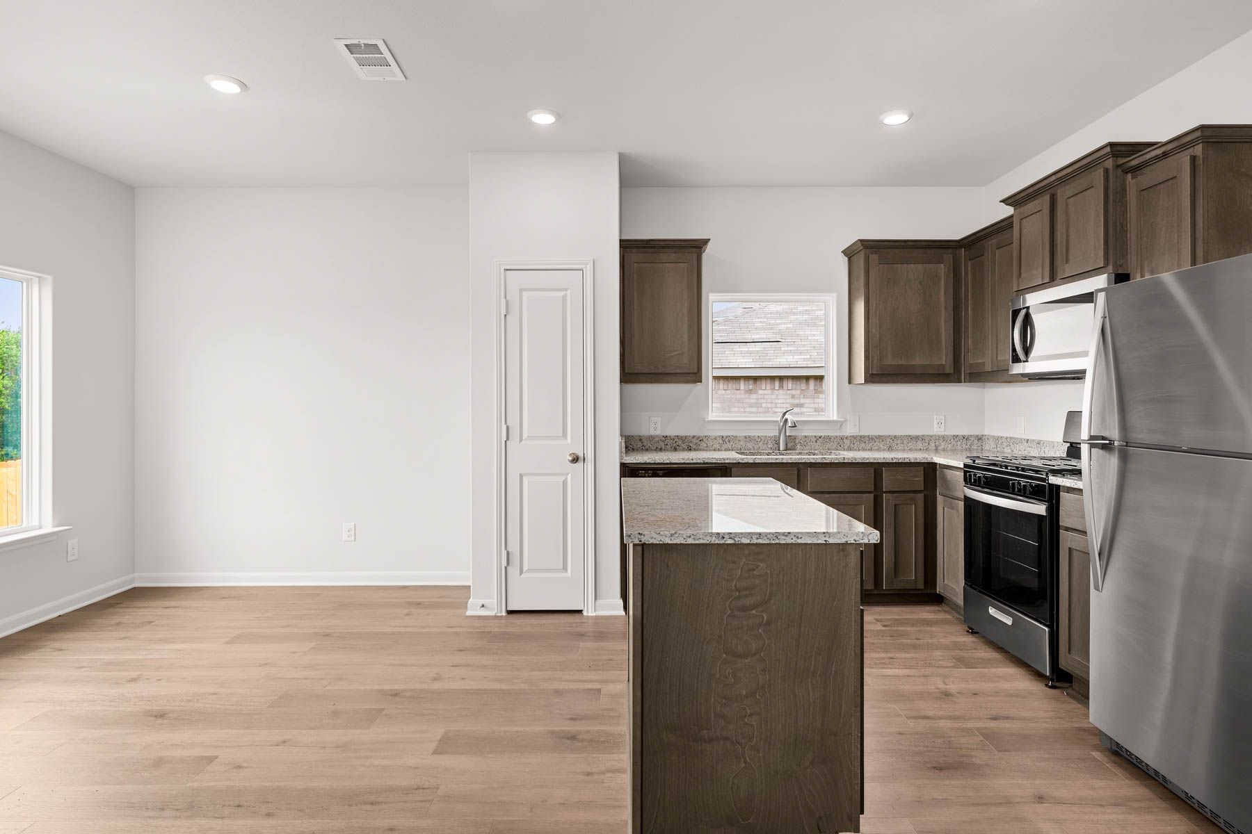 The kitchen has energy-efficient appliances.