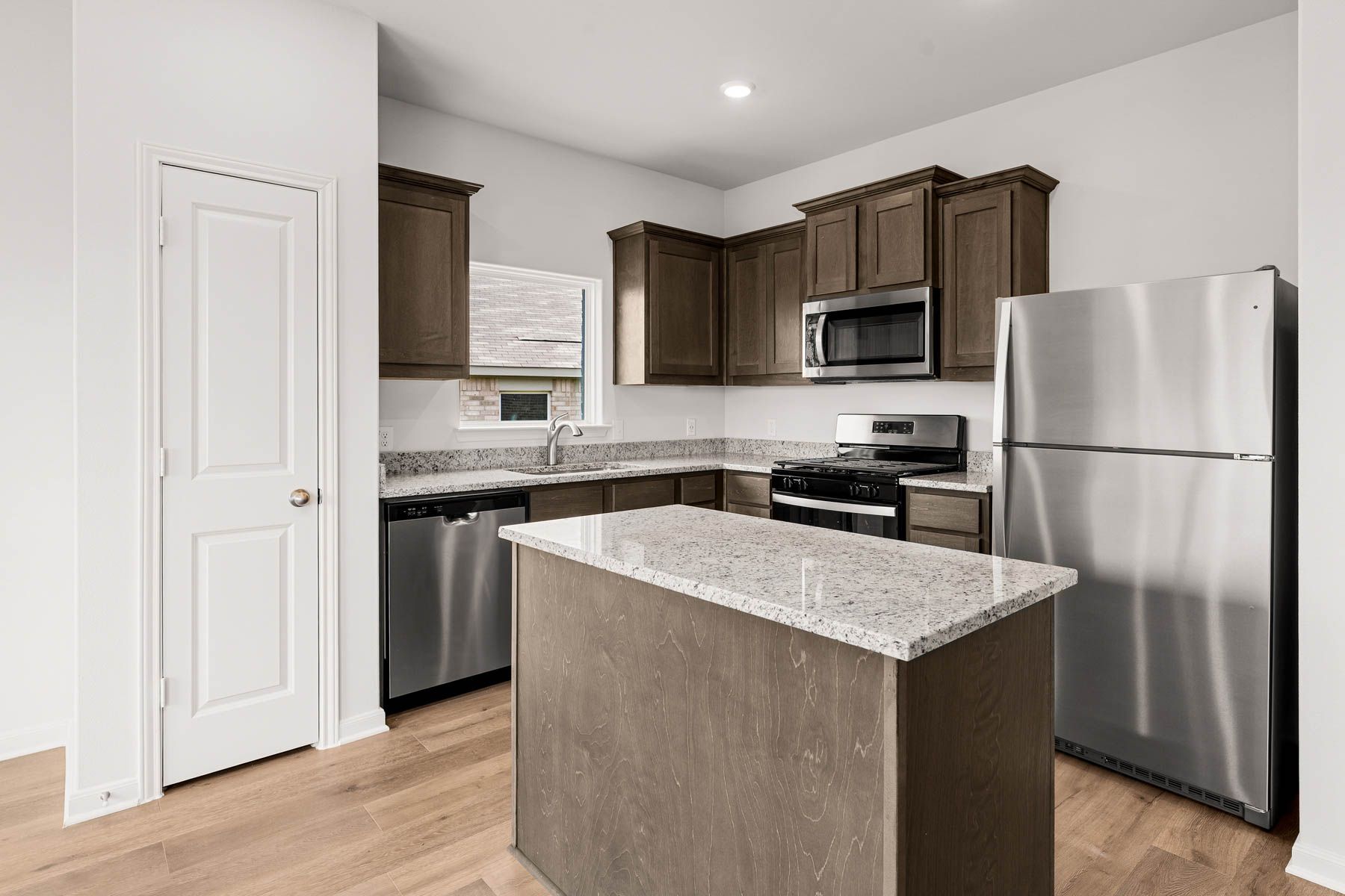 The kitchen has a convenient kitchen island.