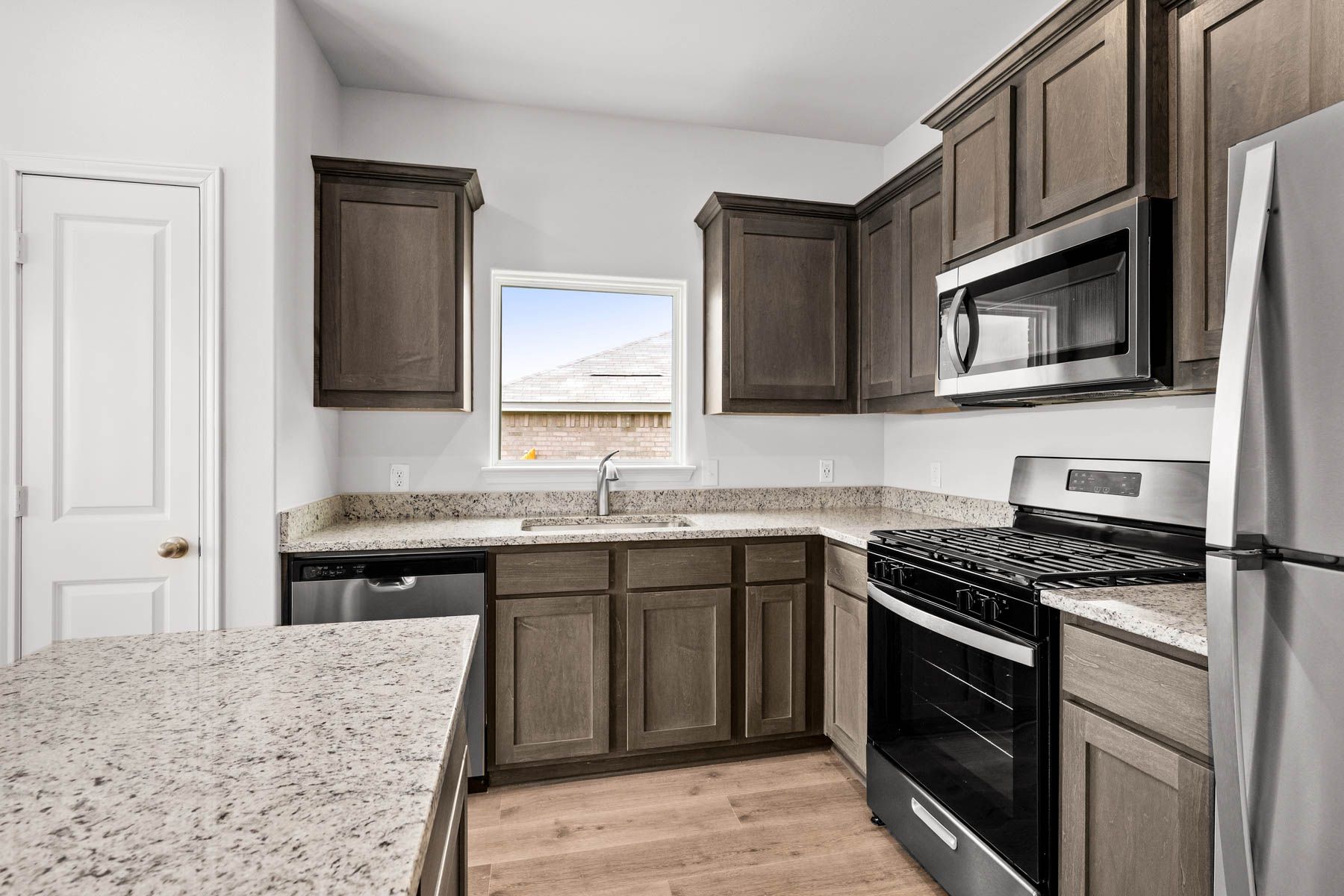 The kitchen has has a wonderful window over the sink.