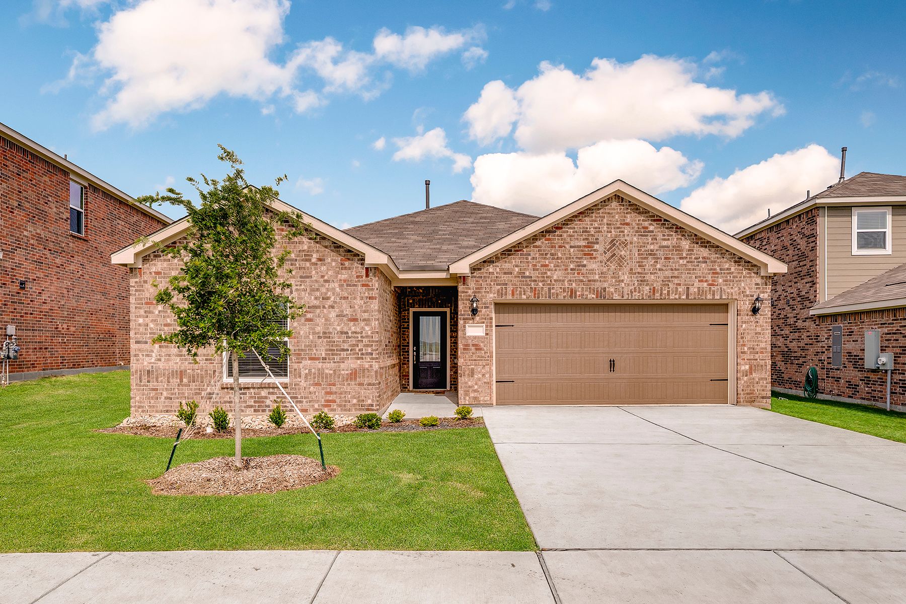 The Sabine is a beautiful one-story brick home.