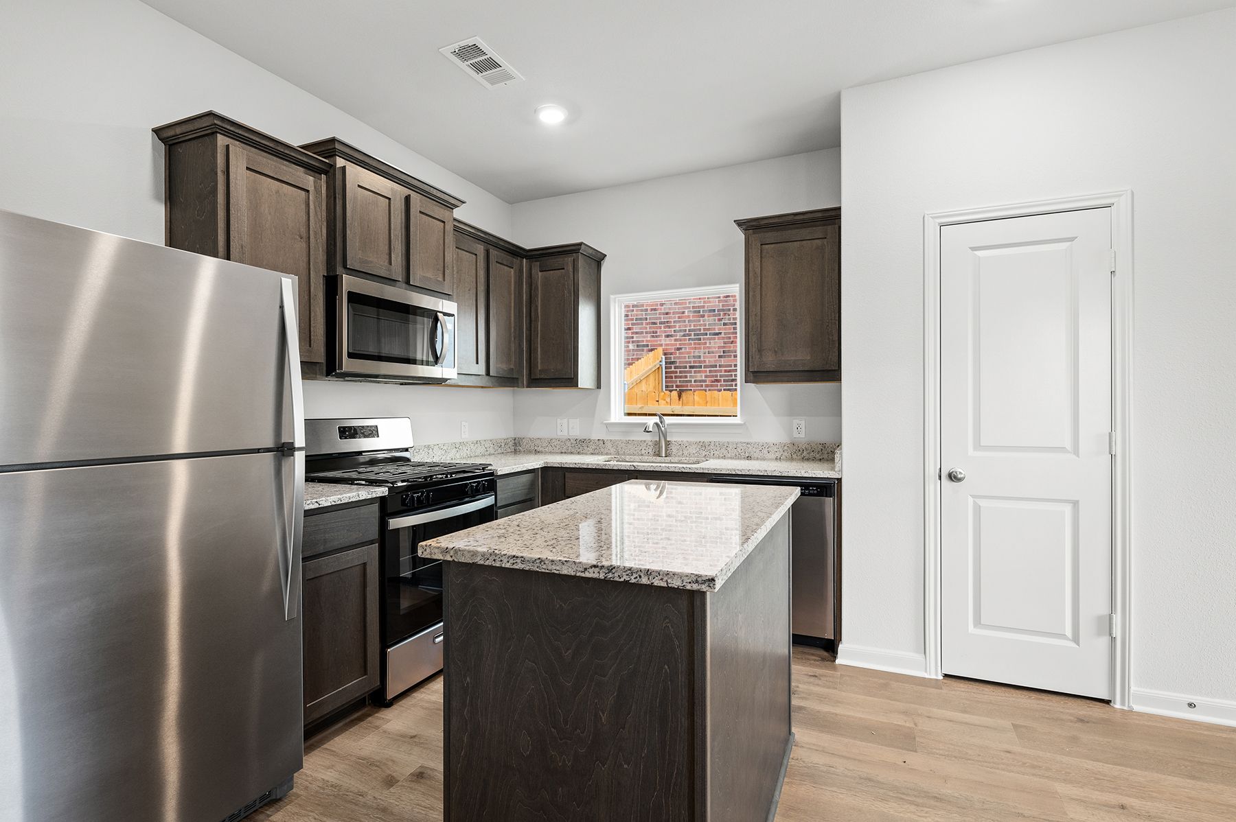 The kitchen has energy-efficient appliances.
