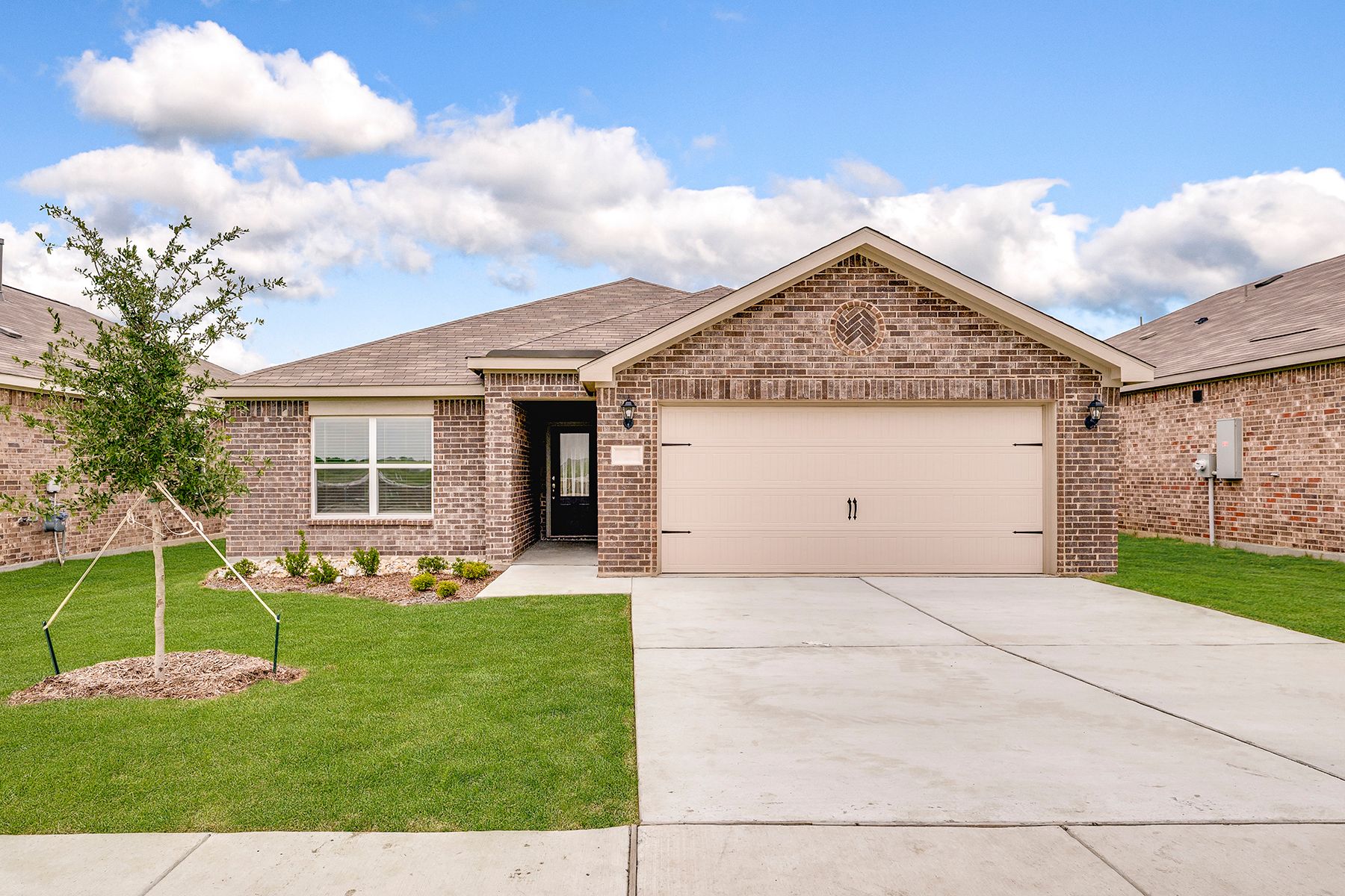 The Rio Grande is a beautiful one-story brick home.