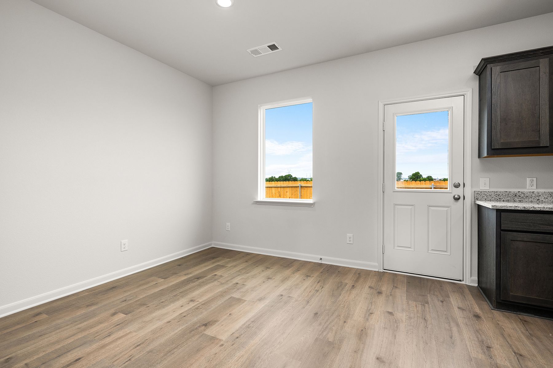 The dining room has large windows.