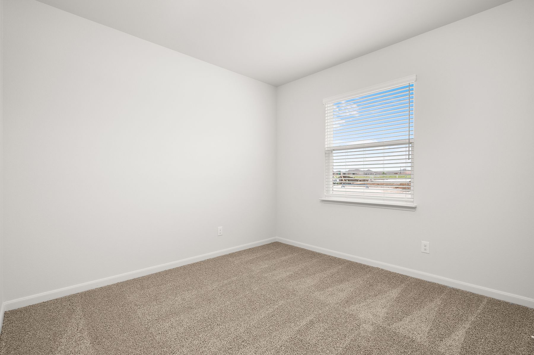 The secondary bedrooms are the perfect space for children's rooms or guest rooms.